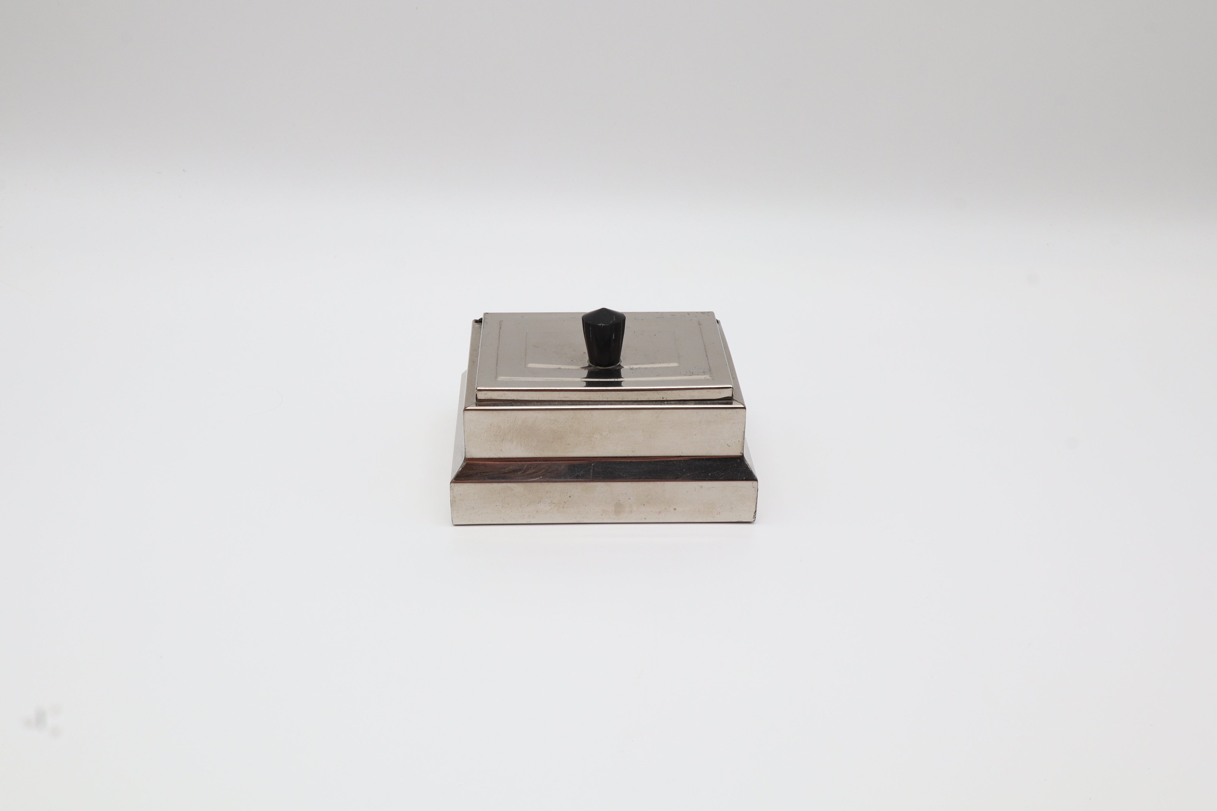 Art Deco Chrome-Plated Box with Bakelite Knob – Netherlands, c. 1930 — lifestyle setting
