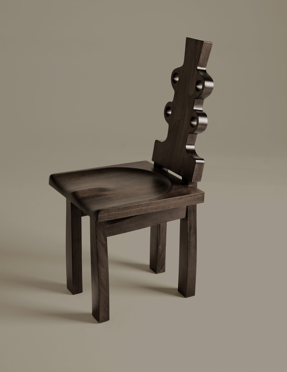 Ewa Chair — close-up of dark wood seat and backrest