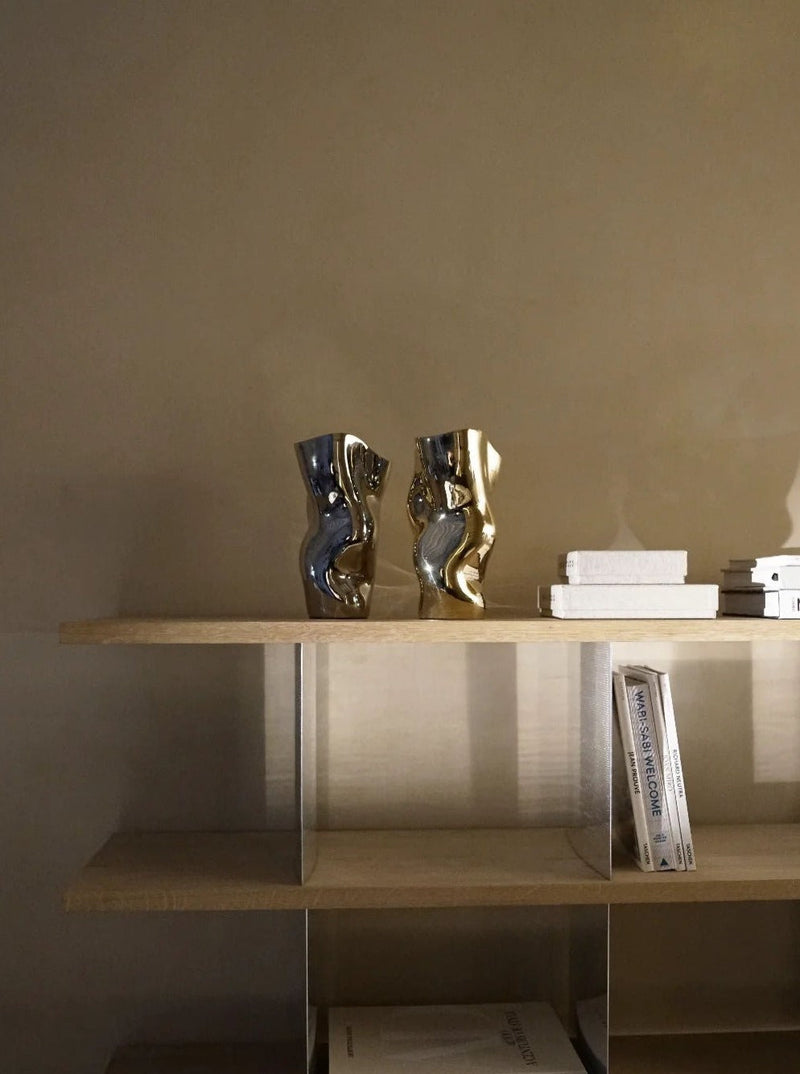 Ostrea 25 - Silver — close-up of silver vase on wooden shelf