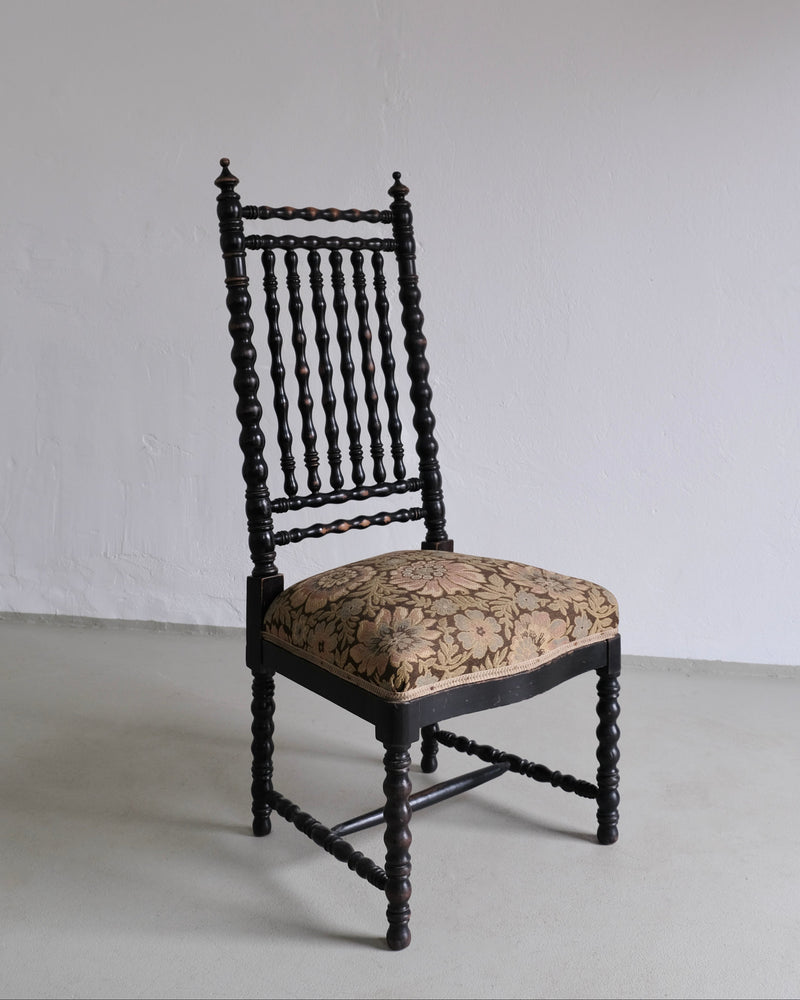 Antique French oak bobbin chair with ornate spindle back, 1850s