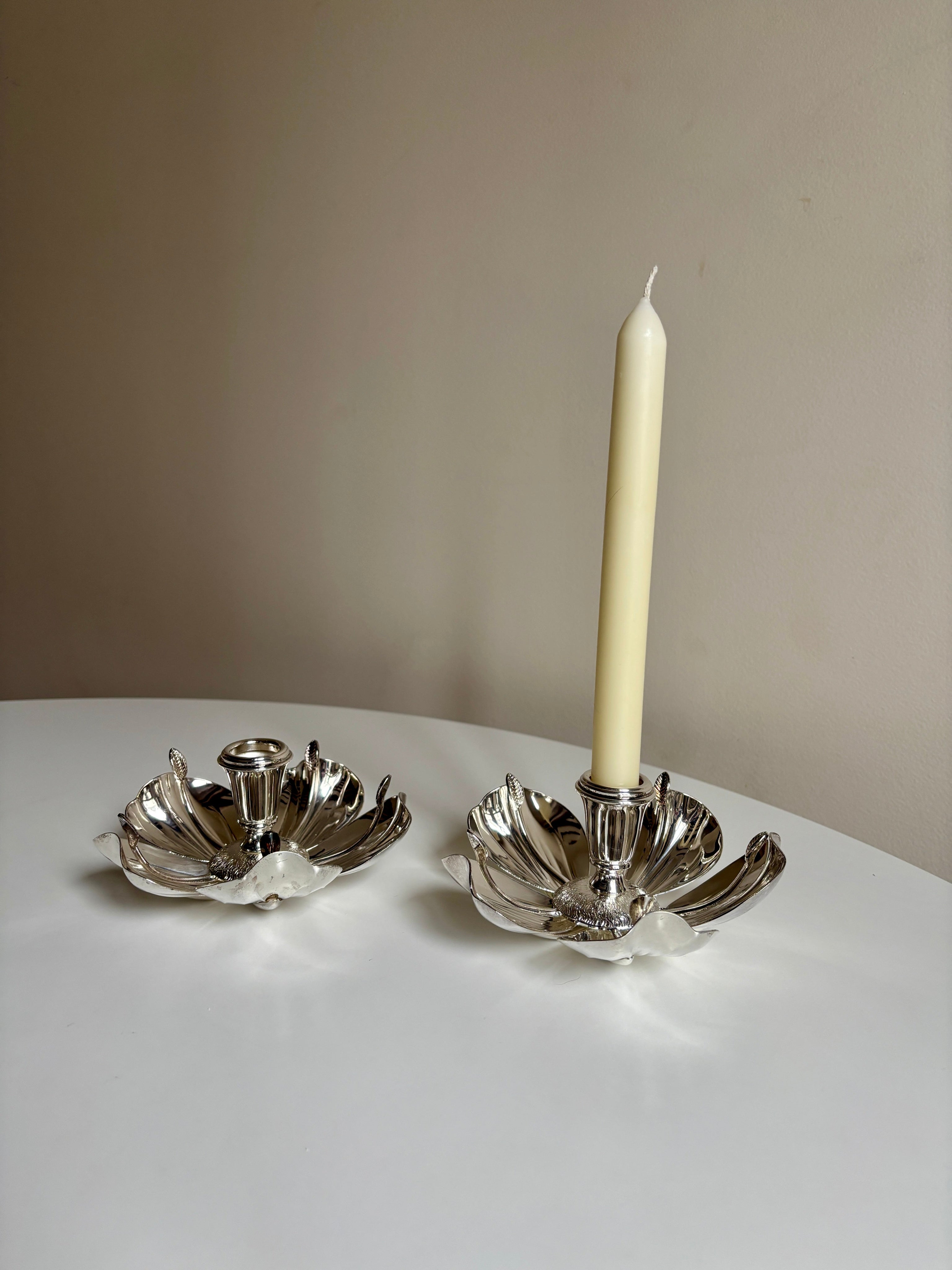 Italian Silver-Plated Magnolia Candleholders - c. 1970s — angled view on white table