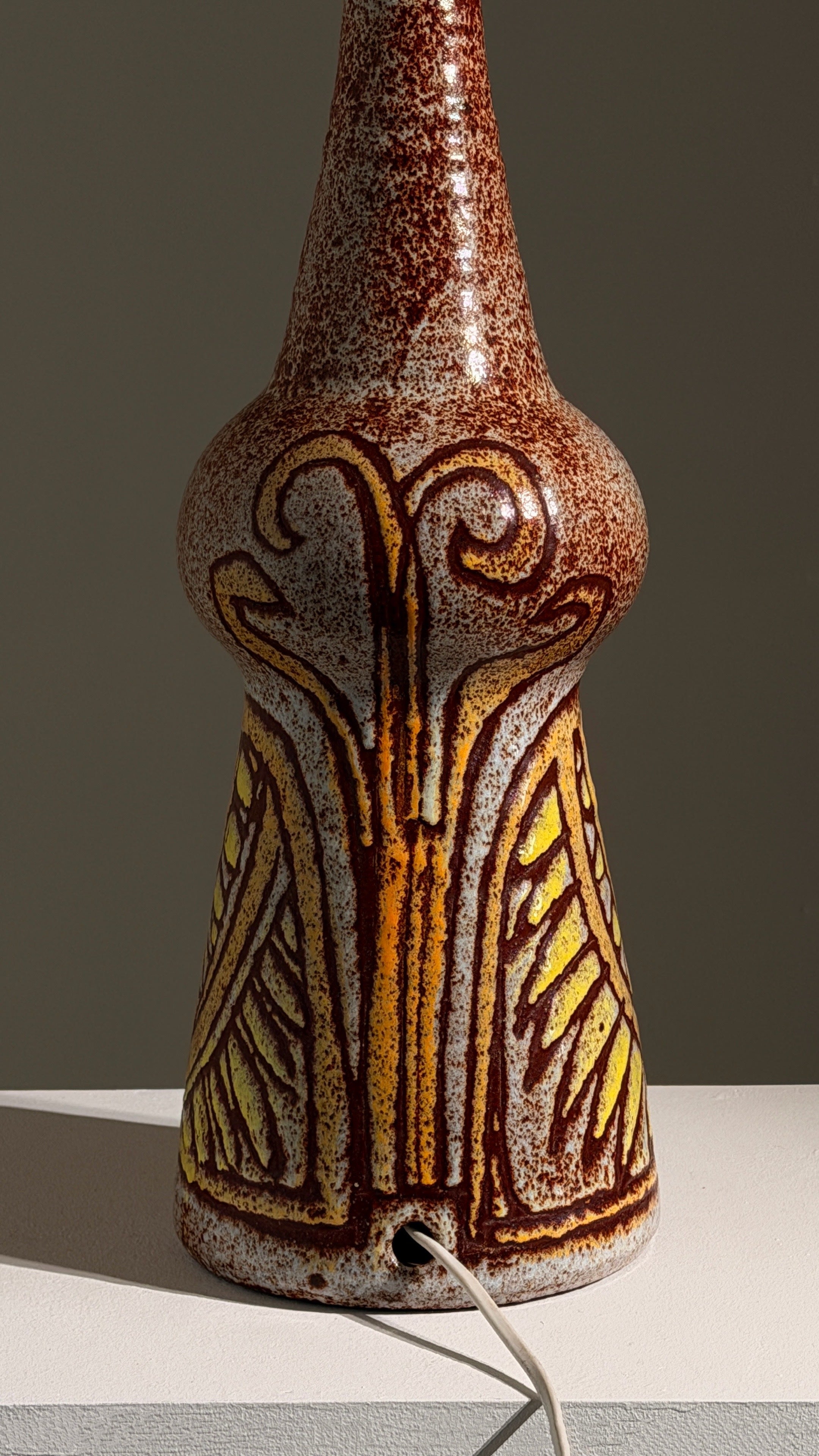 Rare ceramic lamp by the Accolay potters, France, circa 1960 — side angle highlighting textured surface and colors
