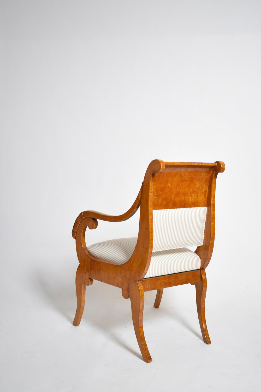 Pair of Etruscan Armchairs, XIXth c. — angled view showing light wood finish and striped upholstery