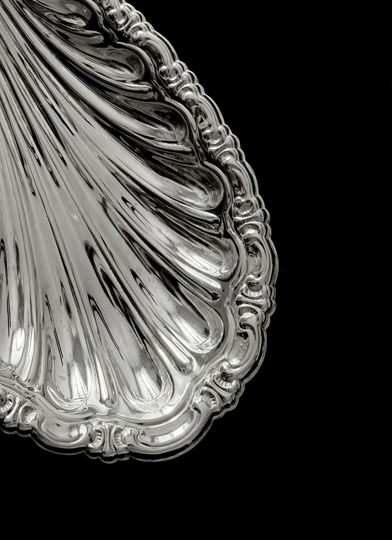 Vintage Dish in Metal — close-up of polished silver surface