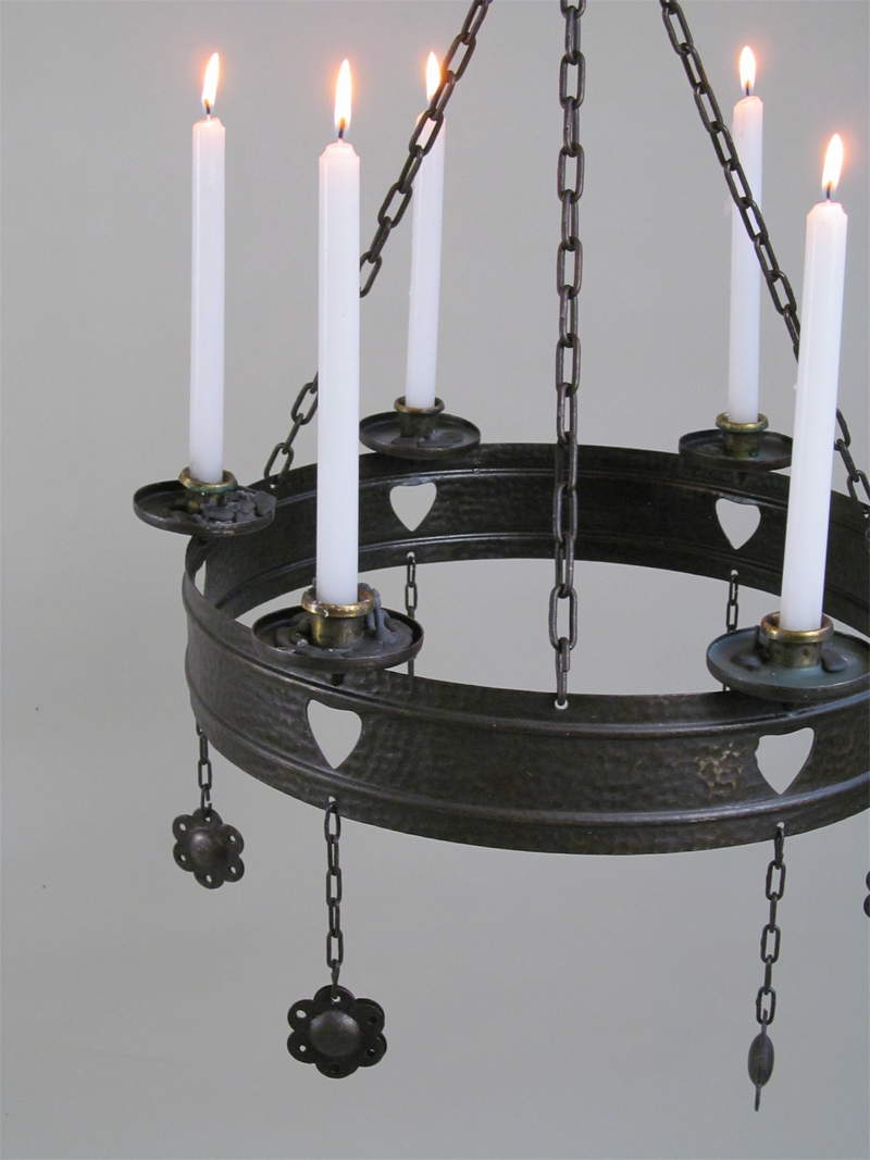 Art Nouveau Wrought-Iron Chandelier Early 20th century — close-up of wrought iron with candles
