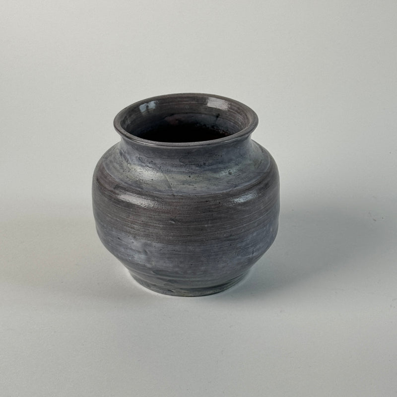 Dark grey brutalist ceramic vase with ribbed texture, France 1960s