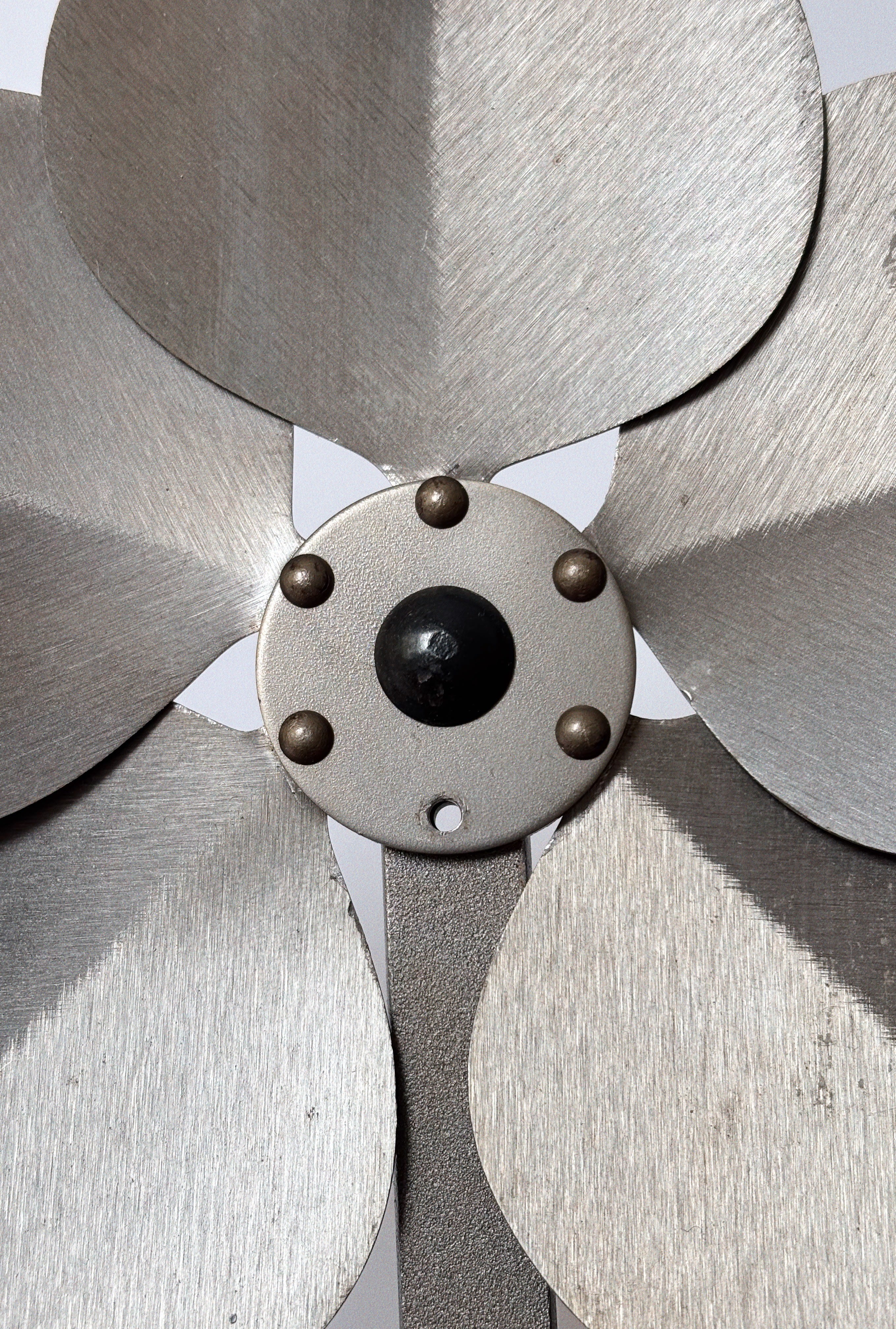 Metal Flower Wall Candleholder — close-up