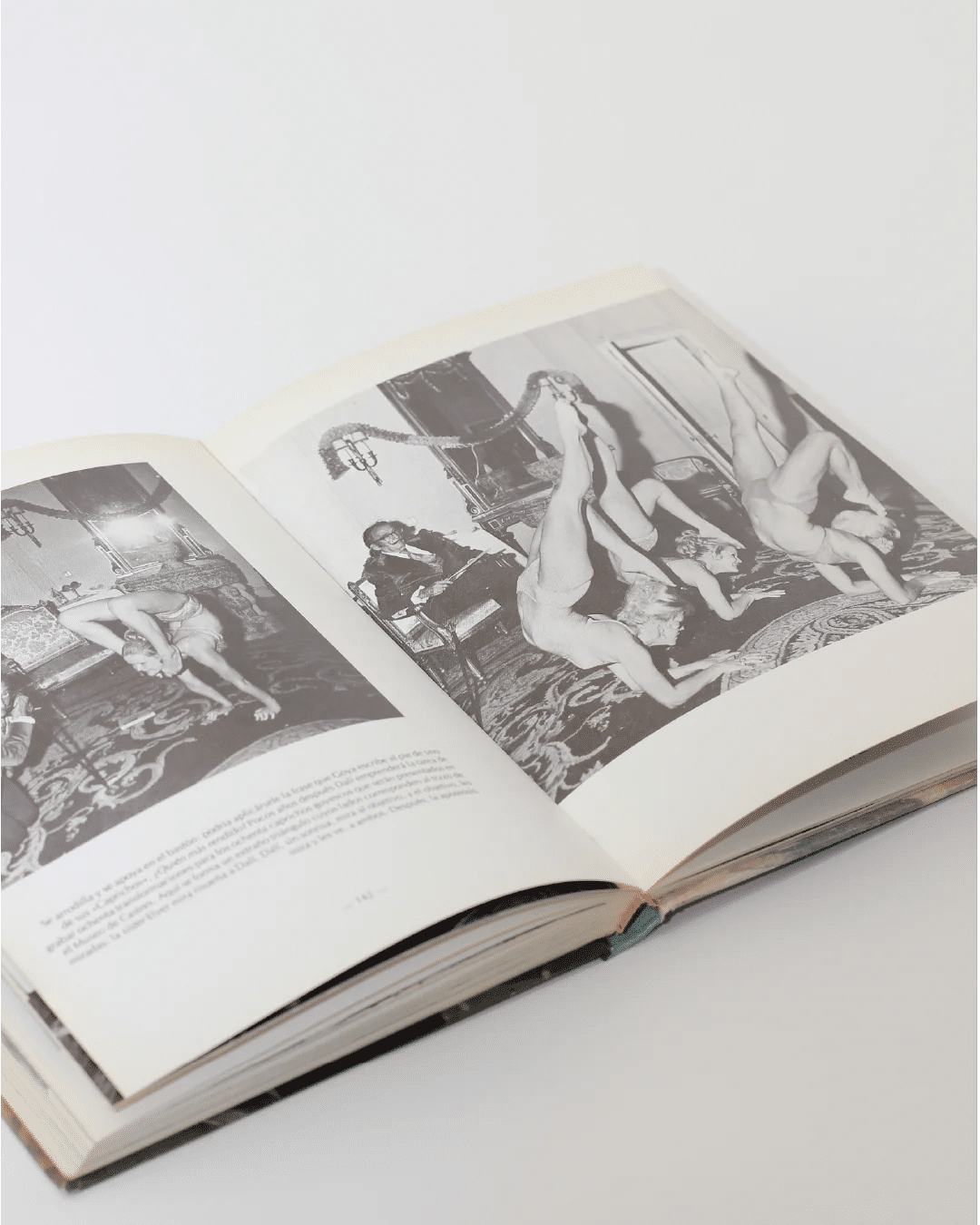 Aquel Dali Book — open view showing black and white photography pages