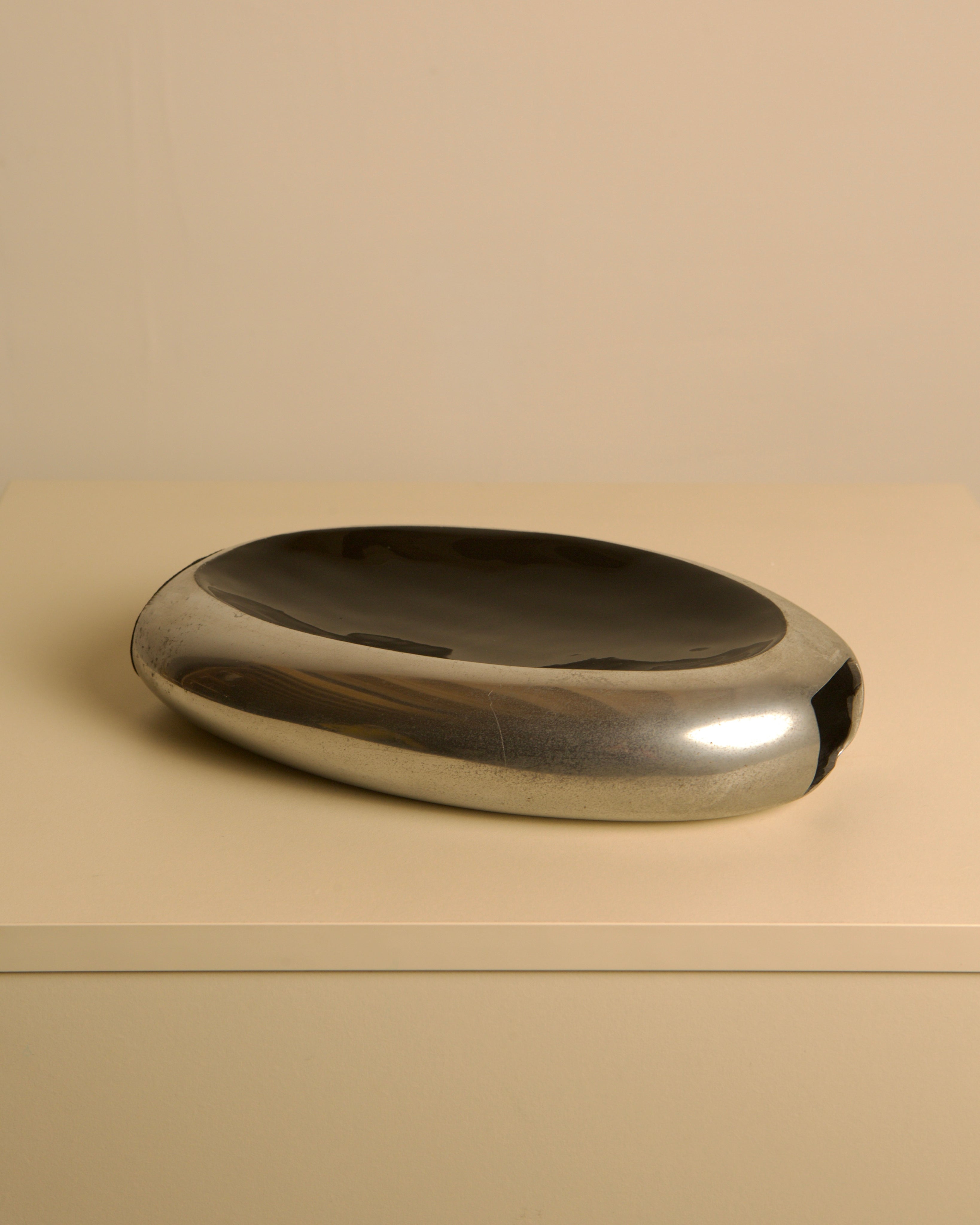 Italian Vase in Aluminum and Black Enamel, 80s — top view on neutral background