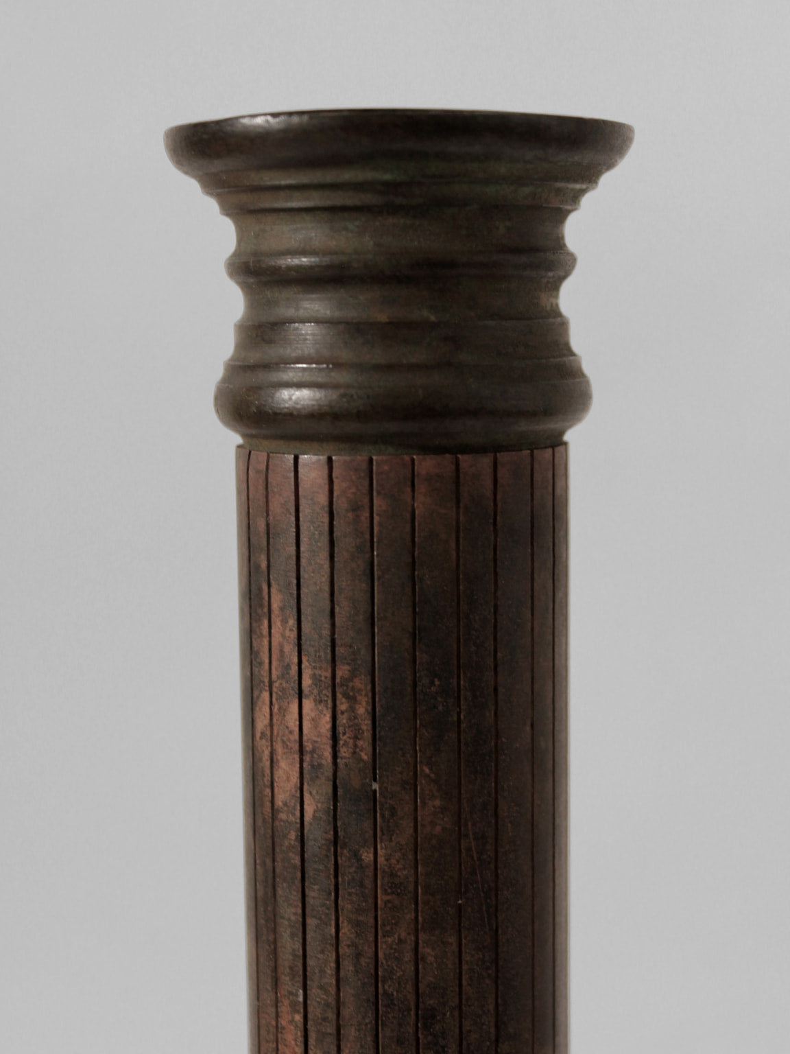 Massive Iron Vintage Candlestick — close-up of textured iron surface