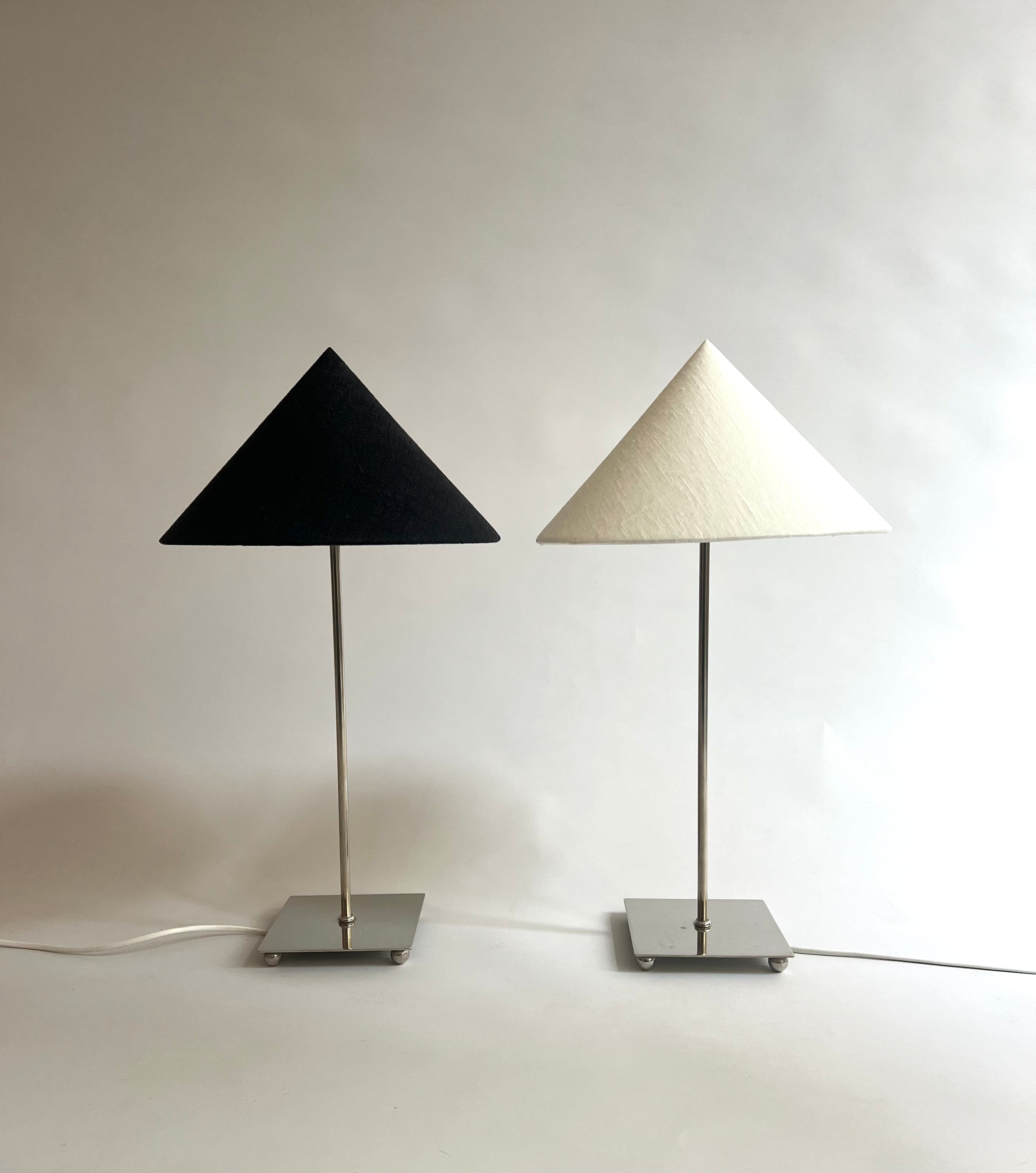 Levento' Table Lamp — close-up of black and white fabric shades