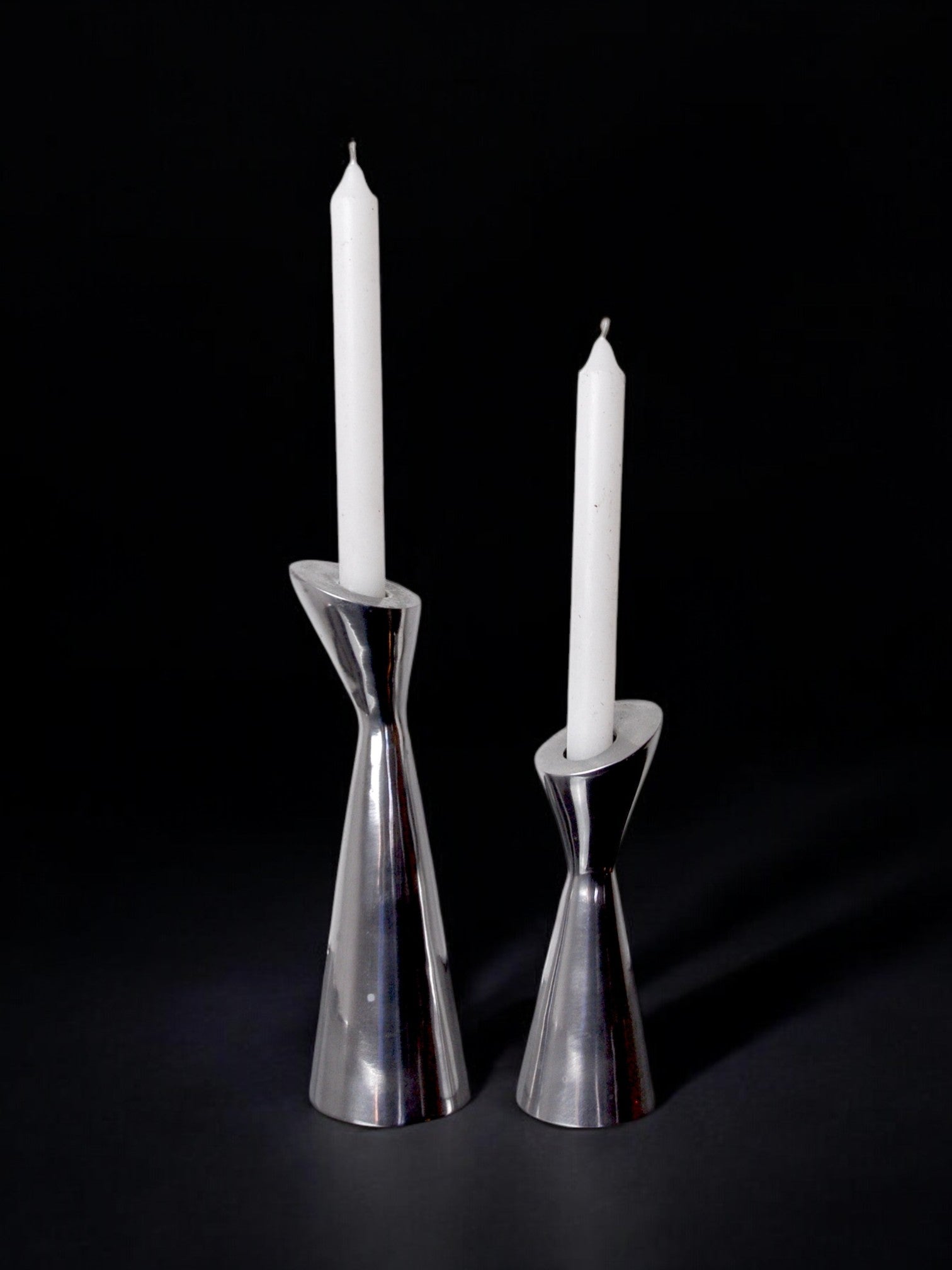 Pair of Swan candlesticks by Matthew Hilton, England, 1980 — detail view