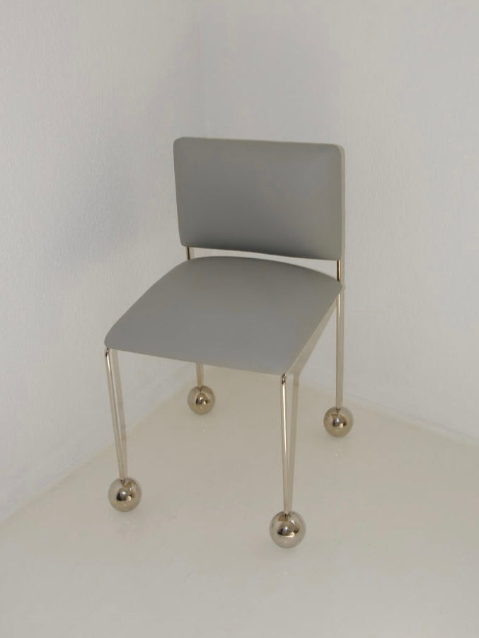 Ball Foot Sculptural Chair in (vegan) leather — lifestyle setting