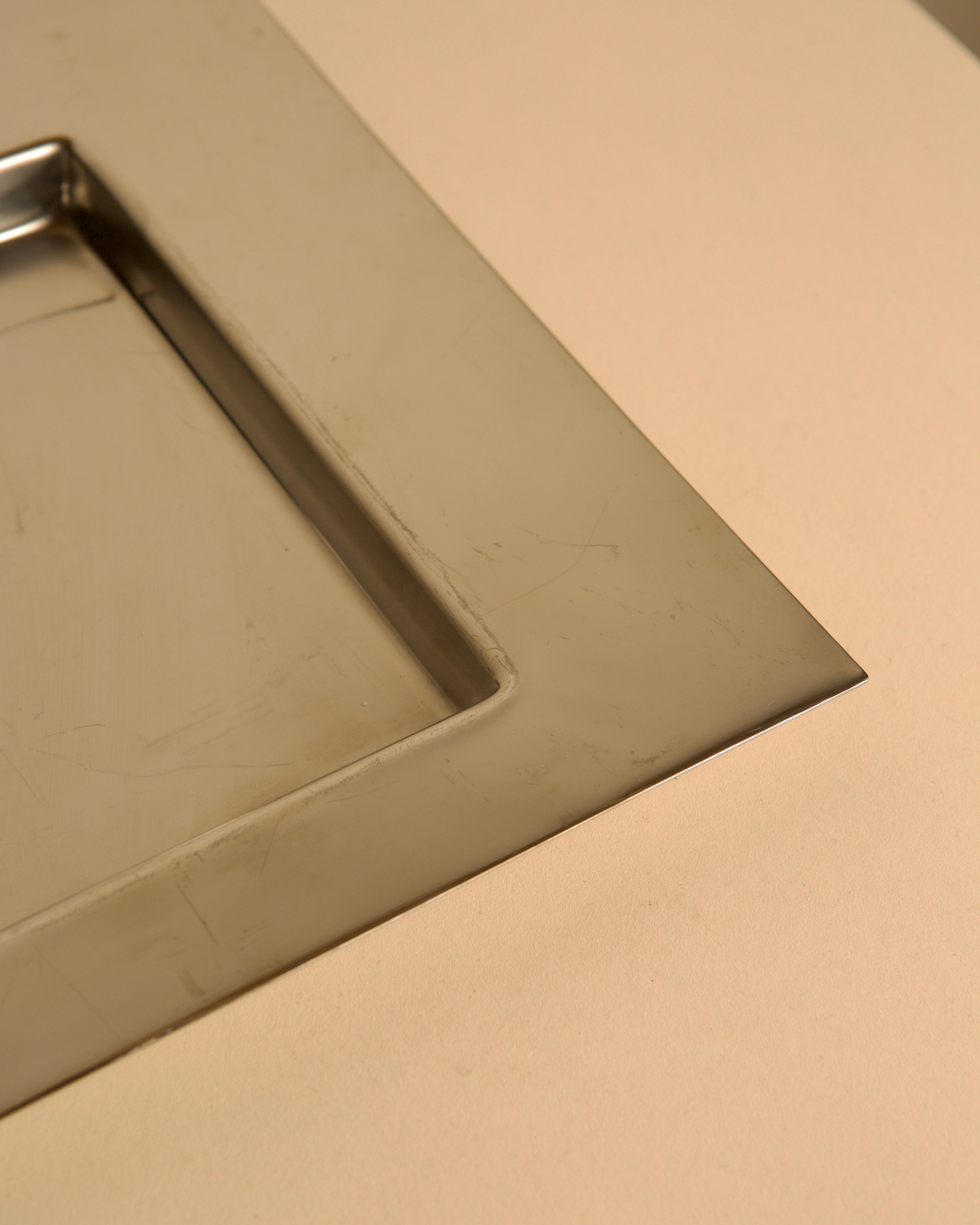Metal tray by Mattia Pastorino for Cleto Munari 70's — side angle
