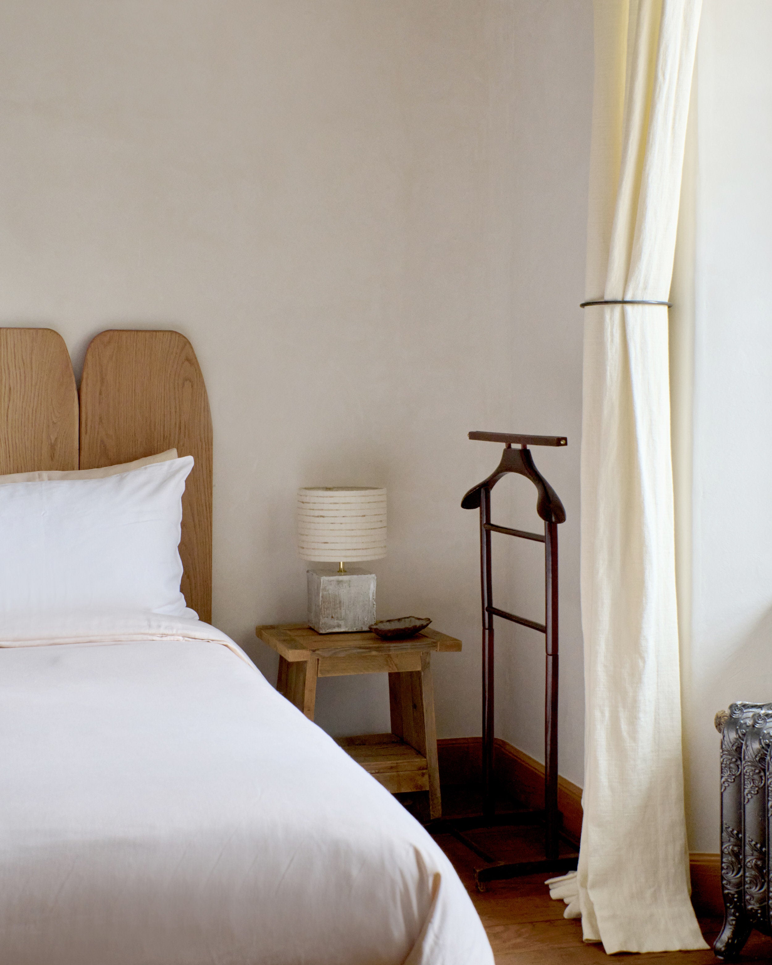 Arouca Table Light White — positioned on wooden nightstand in bedroom