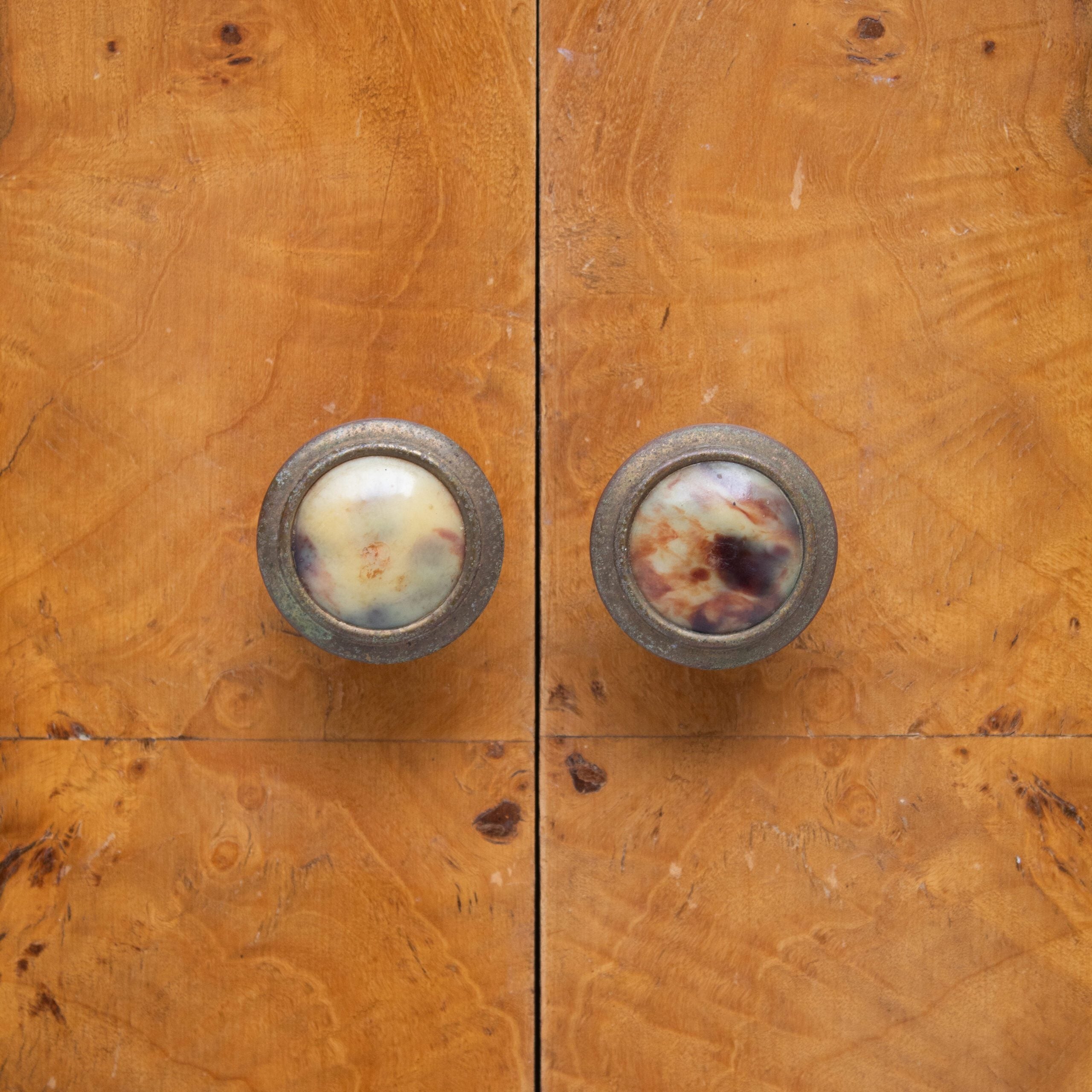 Pair of Italian Art Deco Bedside Cabinets — close-up of decorative knobs on wood