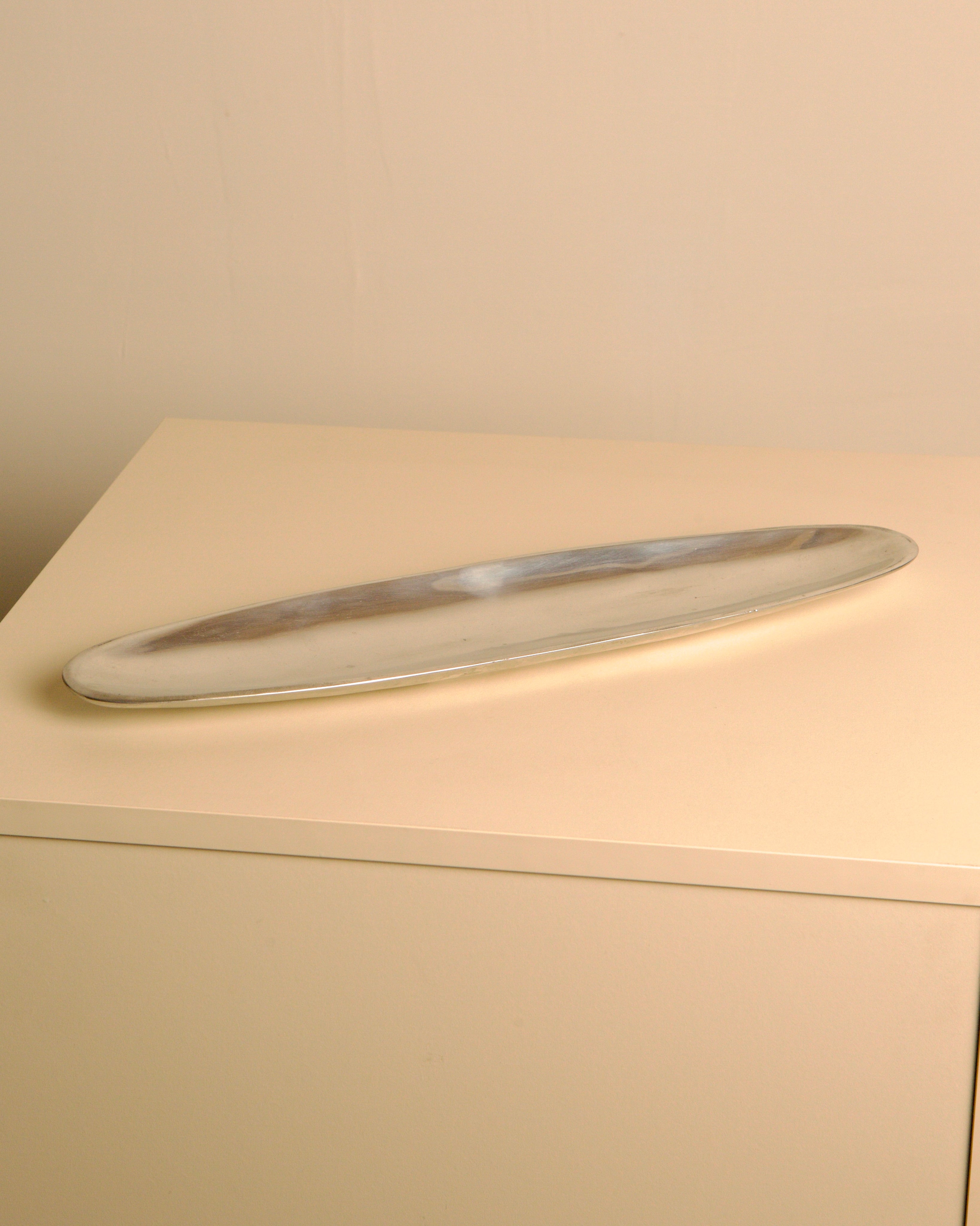 Large Italian Cast Aluminum Valet Tray by PLM Design, 1980s — angled view on neutral surface