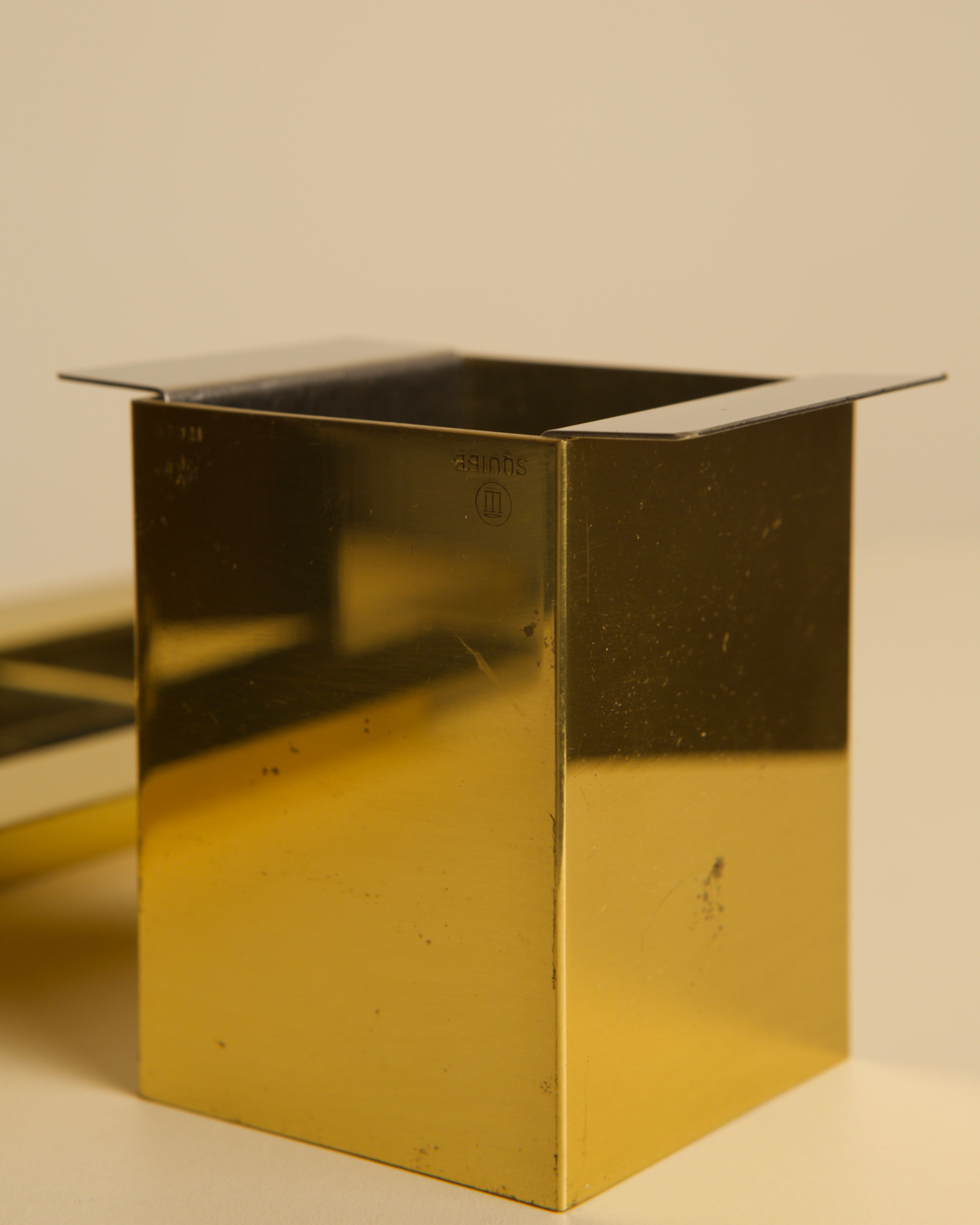 Gold metal pen holder detail from Italian 70s desk set
