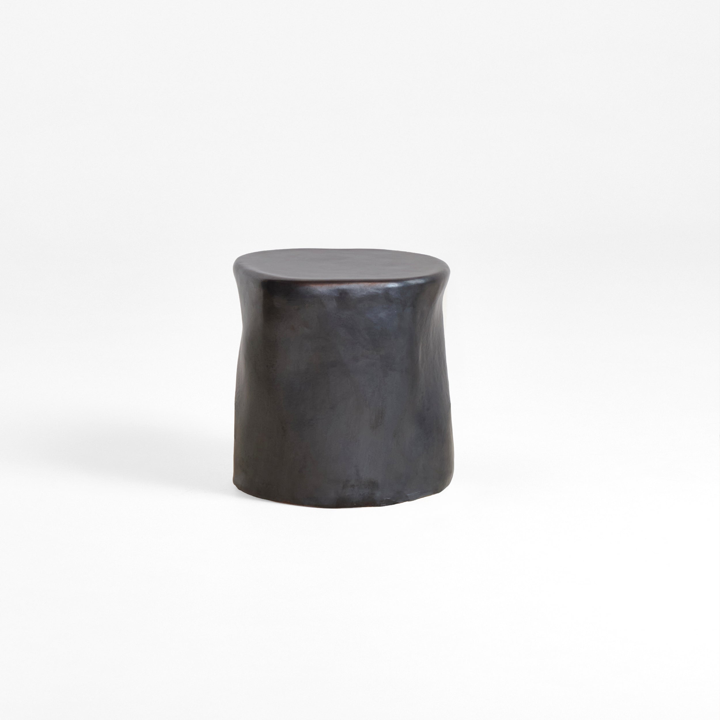 Ceramic Side Table (small) — close-up of matte black ceramic surface
