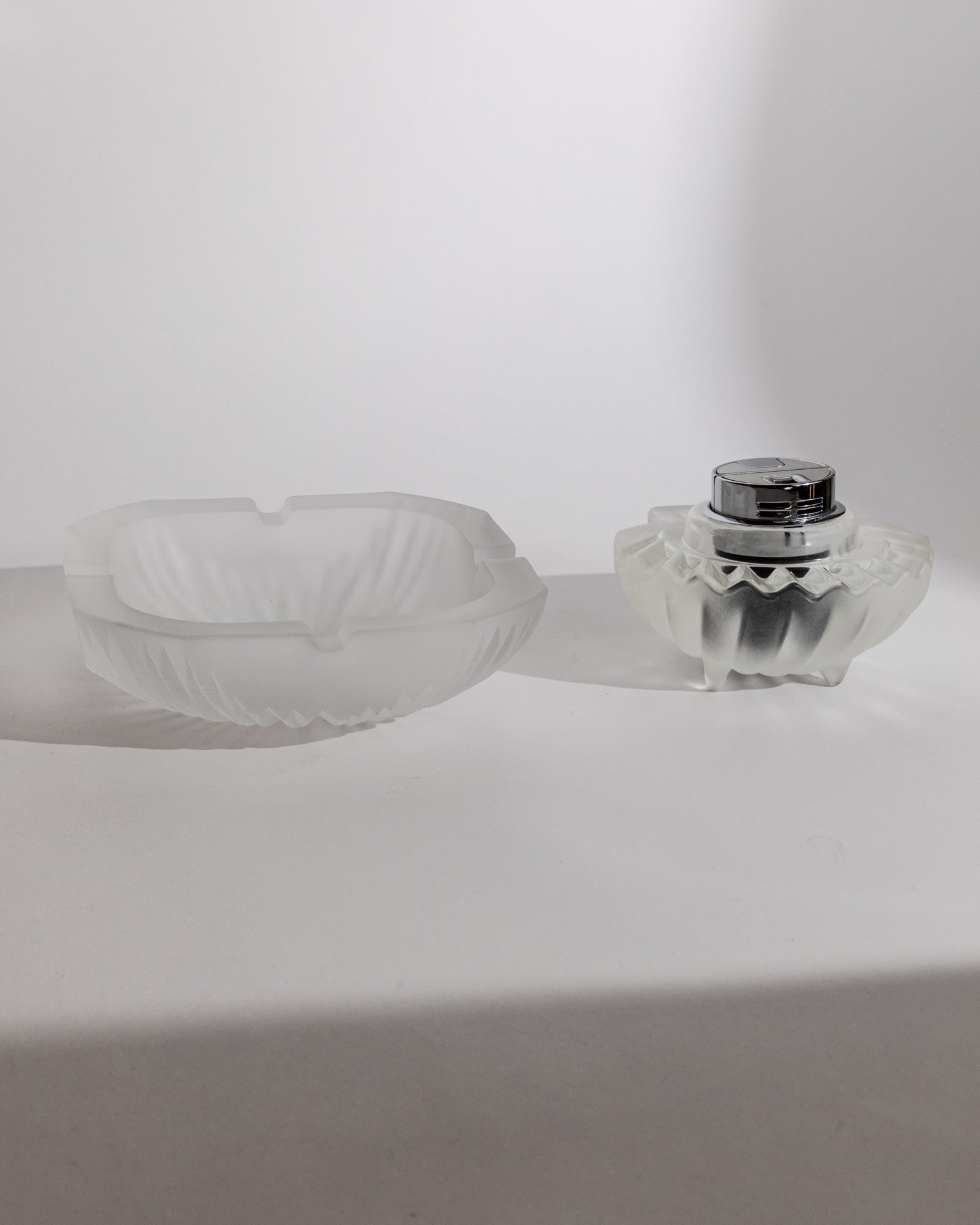 Vintage 1970s Smoking Set, Ashtray and Table Lighter, Frosted Textured Glass, Shell Shape — angled view on white surface