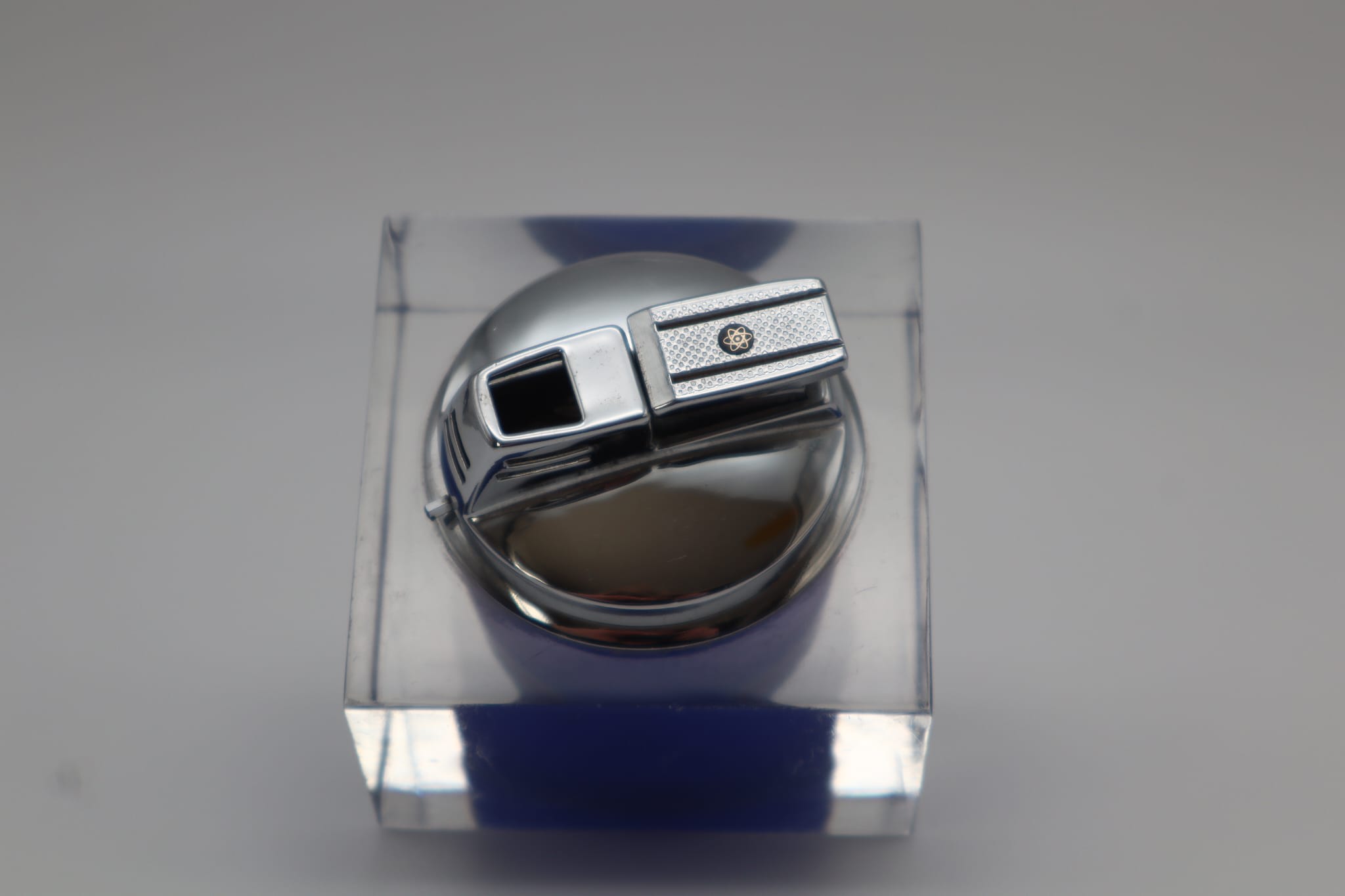 Ronson Lighter, 1960s — top view on clear acrylic display
