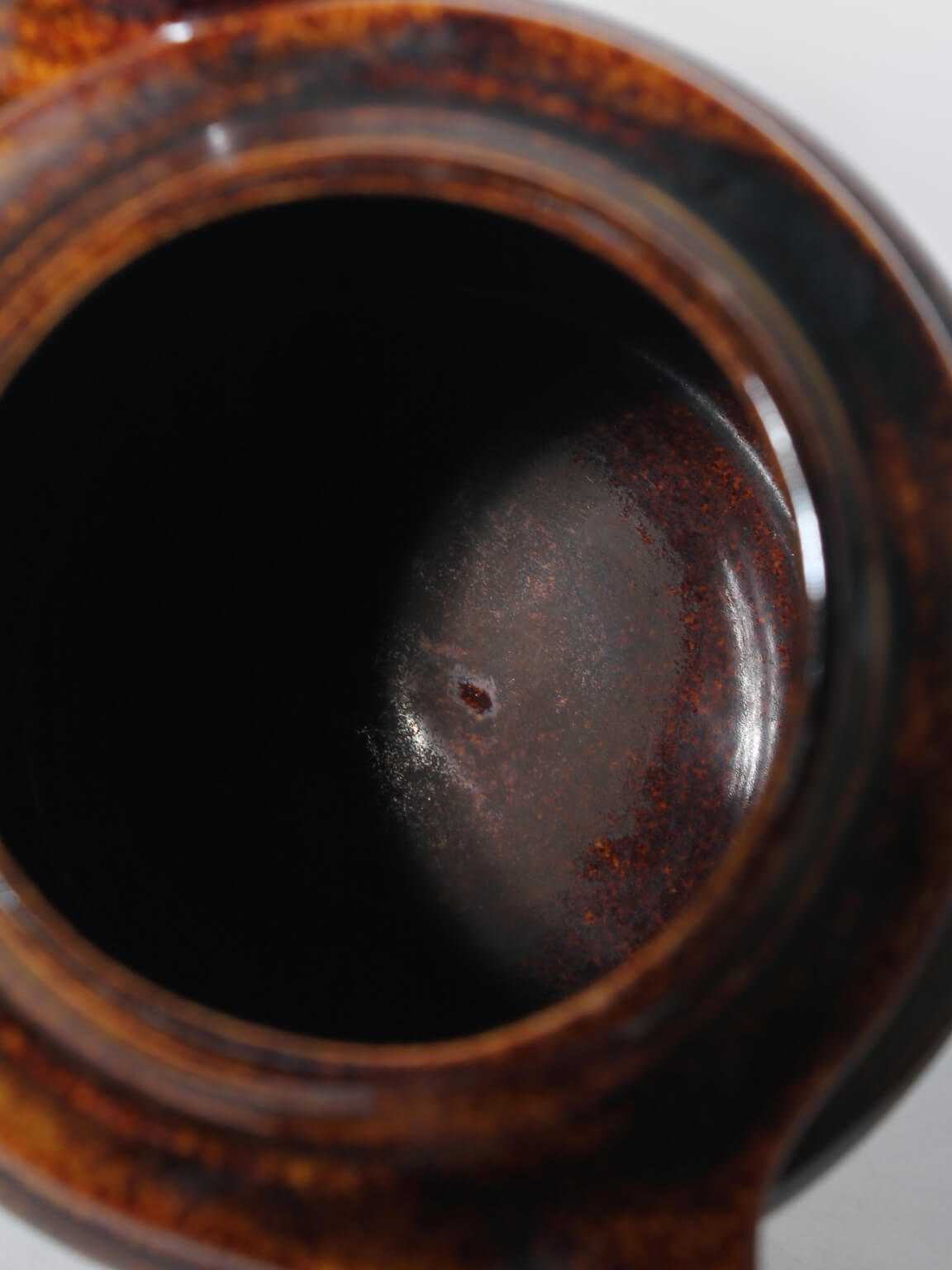 Ulla Procopé, Göran Bäck "Kaarna" Ceramic Glazed Teapot — interior view showing rich brown glaze texture