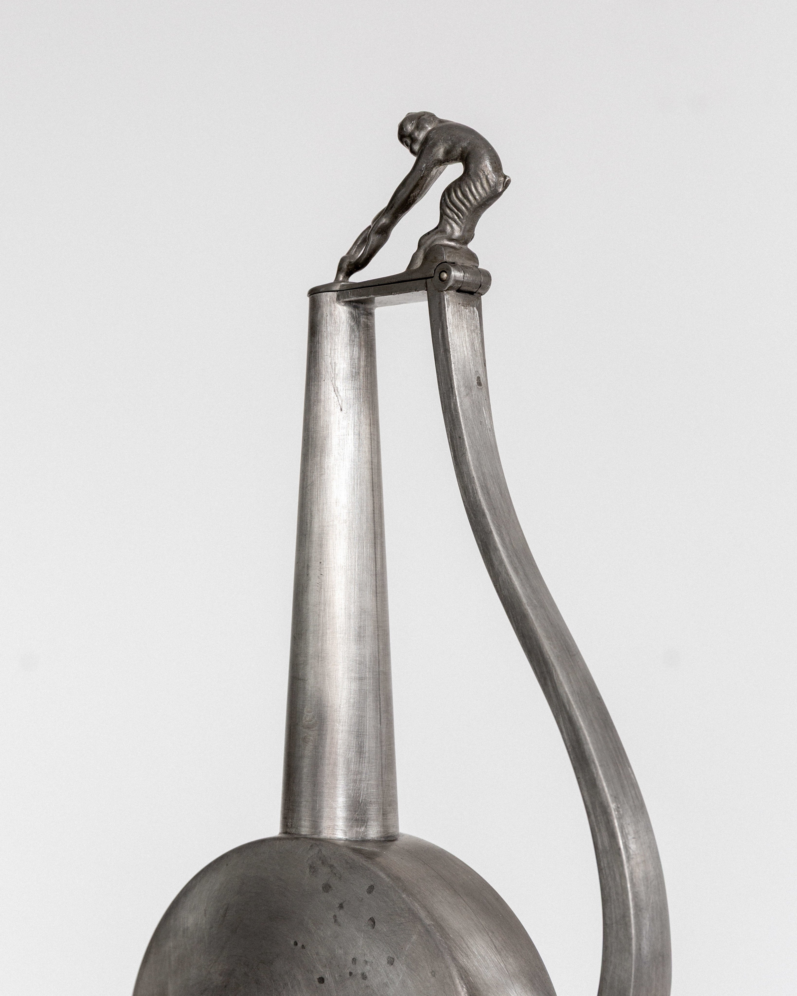 Sculptural Art Deco Pewter Pitcher by GAB, Sweden, 1930s — side angle highlighting sculpted handle detail