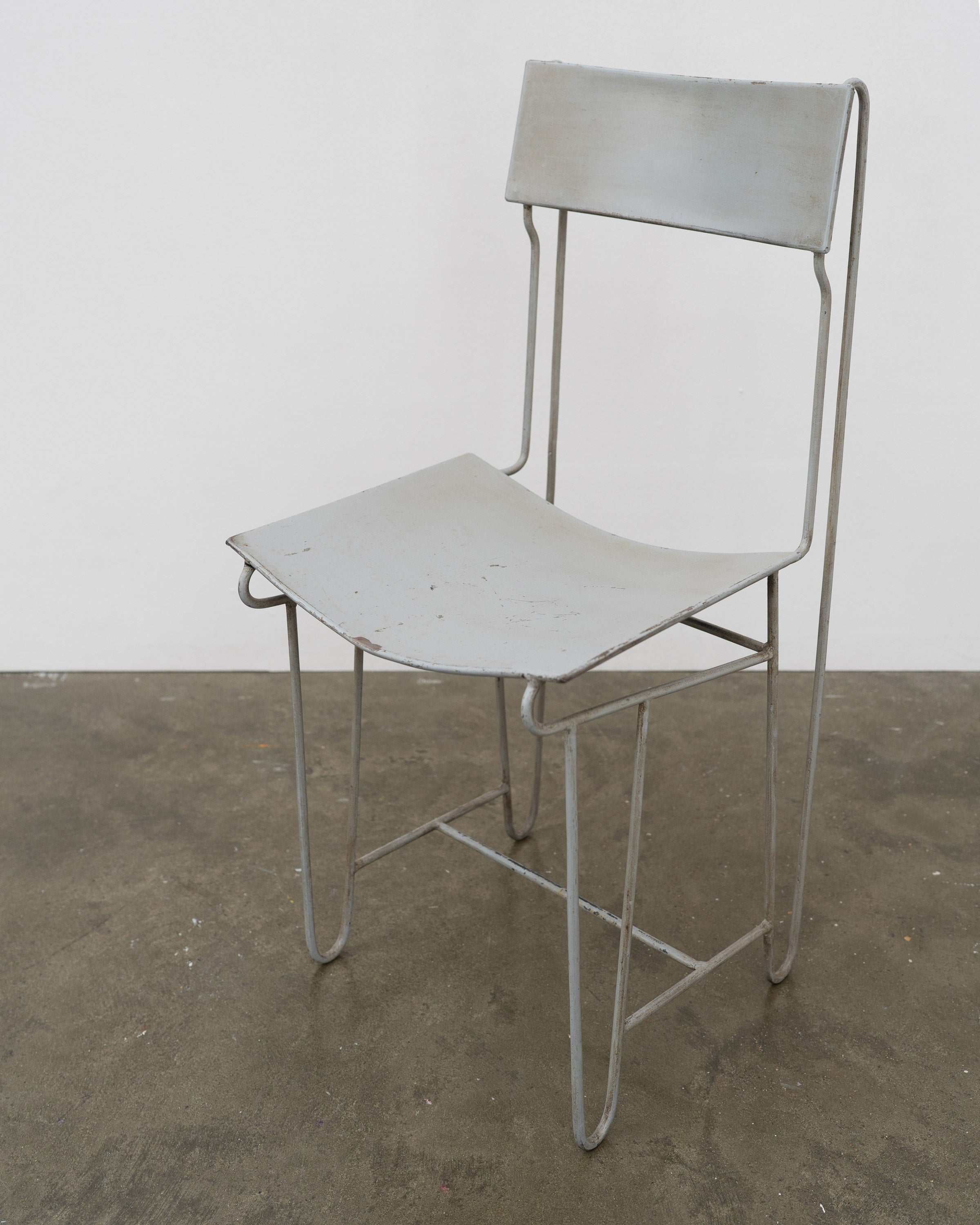 Modernist Steel Chair — top view of gray metal seat