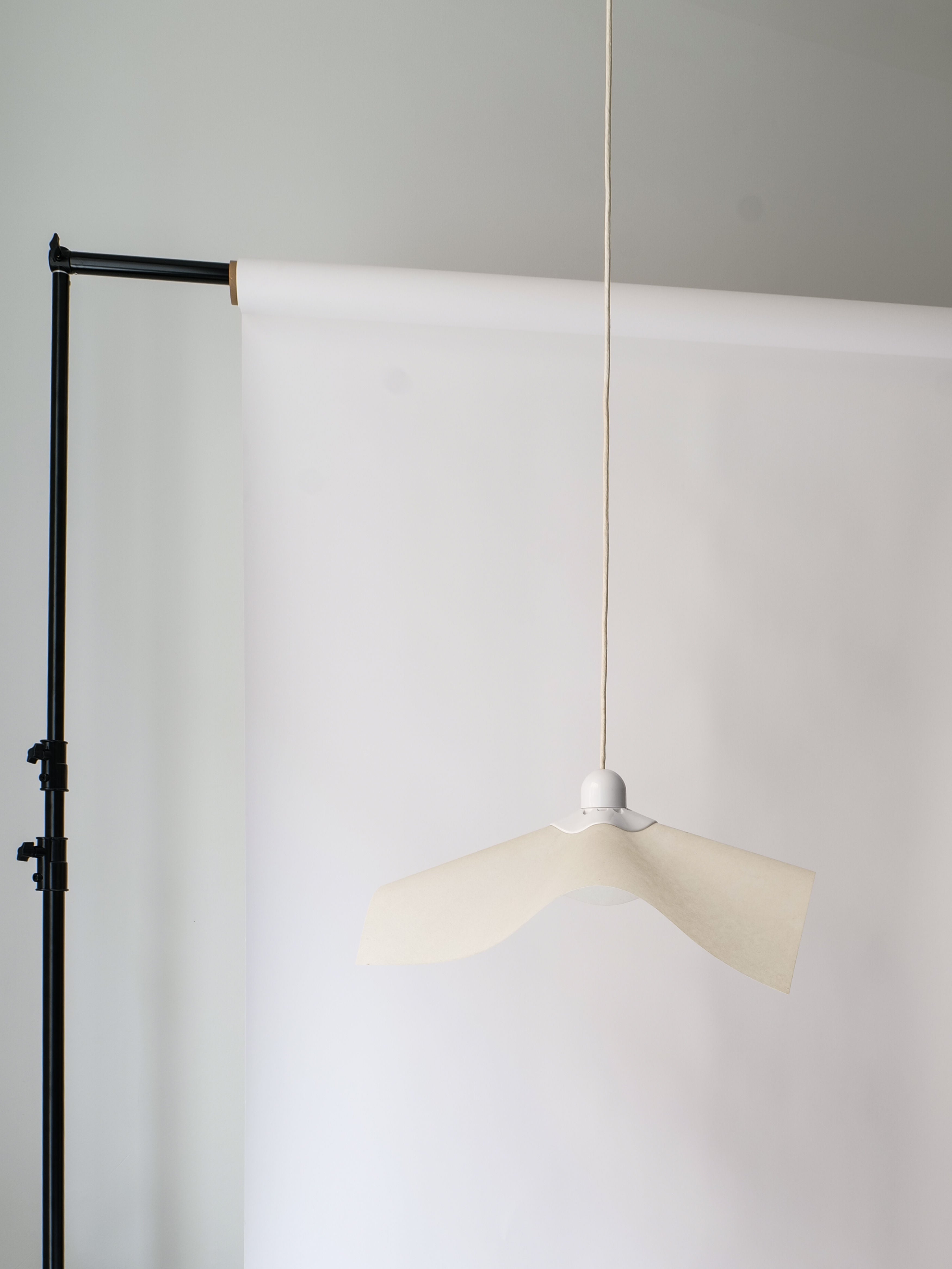 Adjustable Ceiling Lamp Mario Bellini 1970 — top view of white pendant light