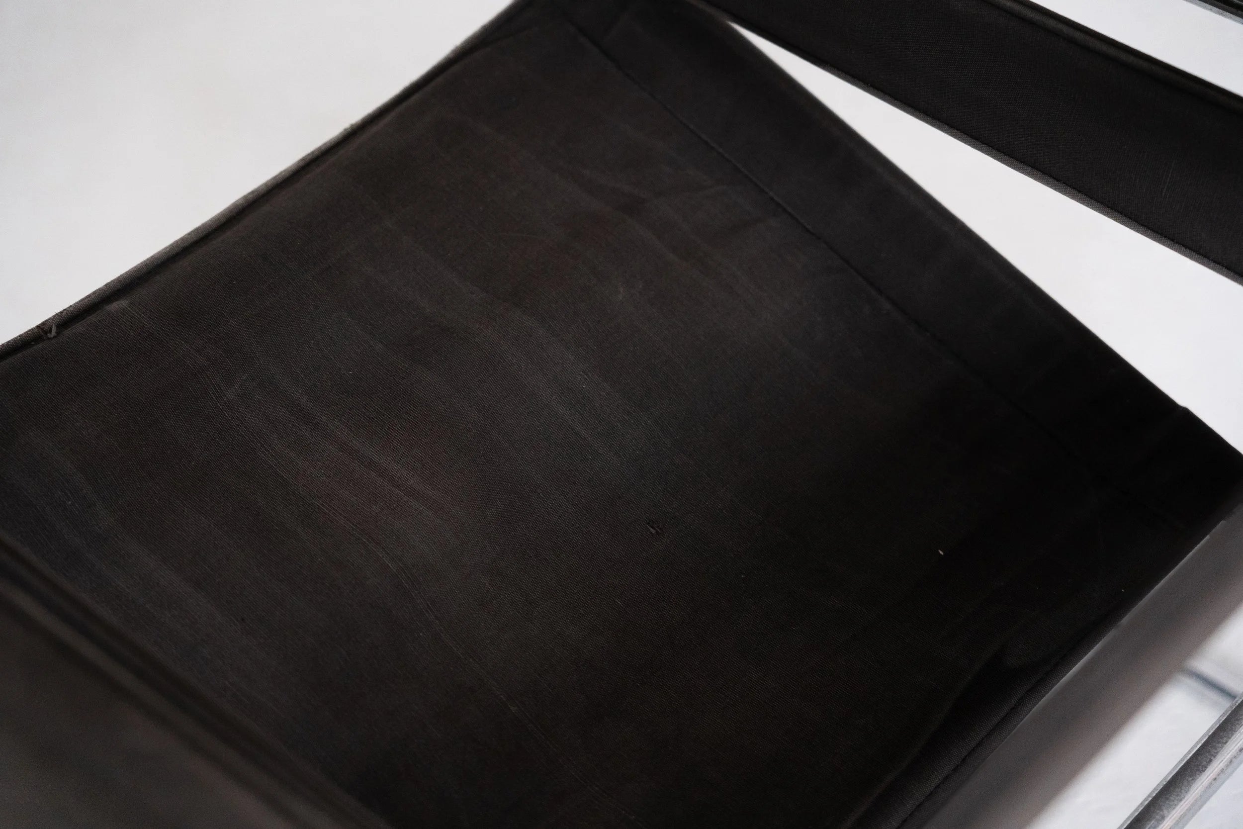 Wassily Chair by Marcel Breuer for Gavina — back view of black canvas seat