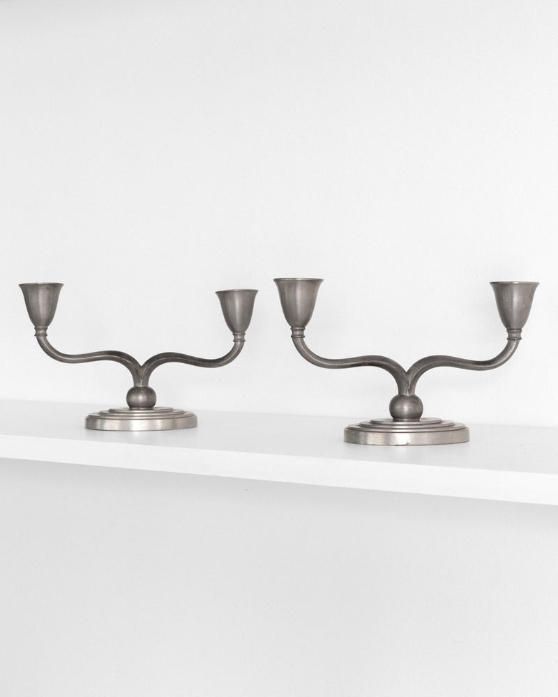 Pair of Pewter Candelabras by Just Andersen, Denmark, 1930s-40s — close-up of candle holders on white shelf