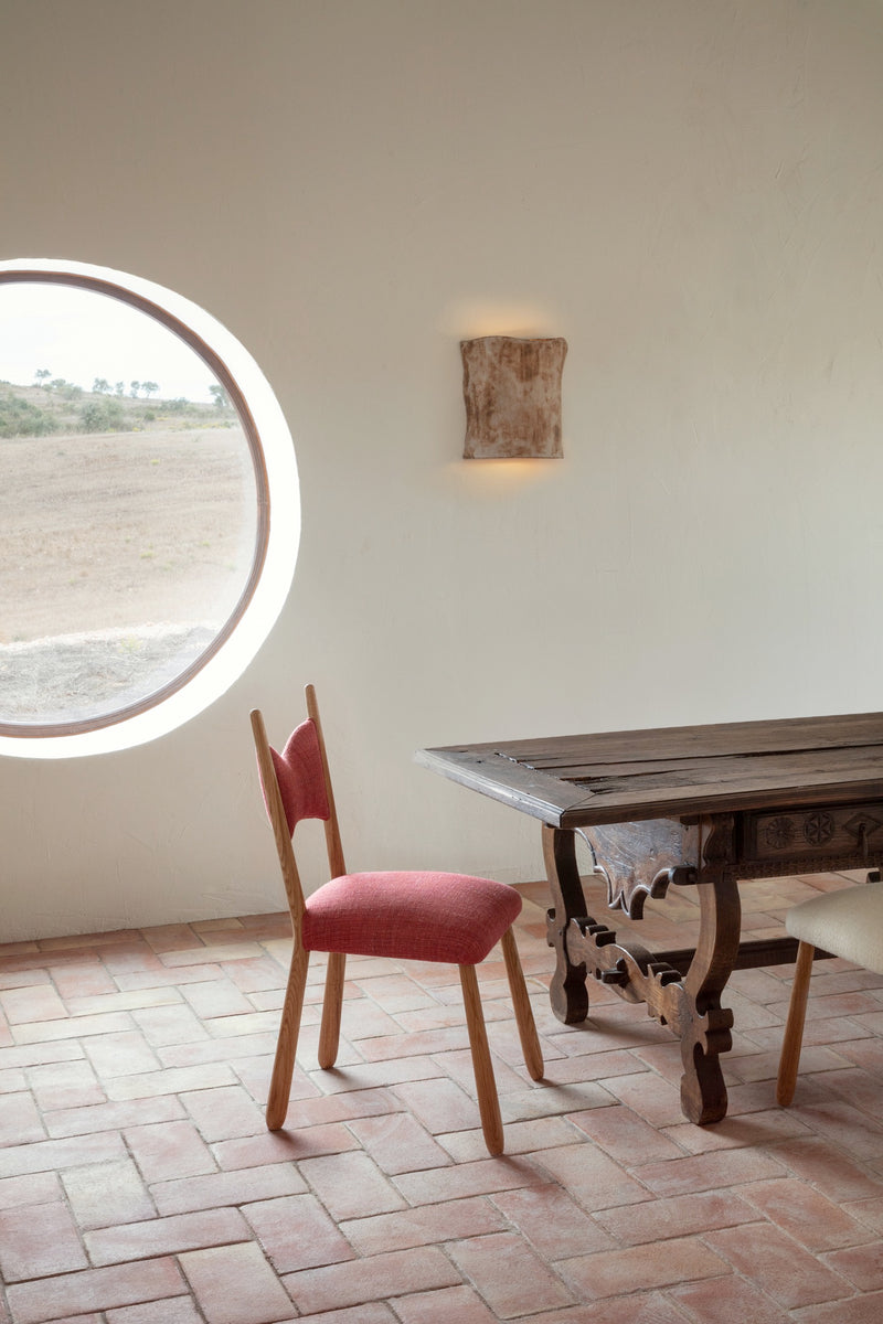 Papel Wall Light — close-up of light against textured wall