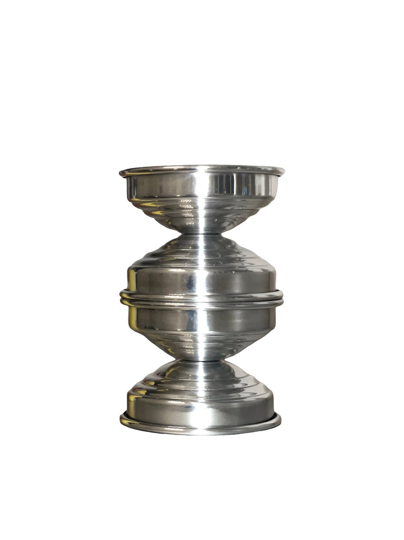 Metal Candle Holders in Polished Aluminum — close-up view highlighting reflective surface