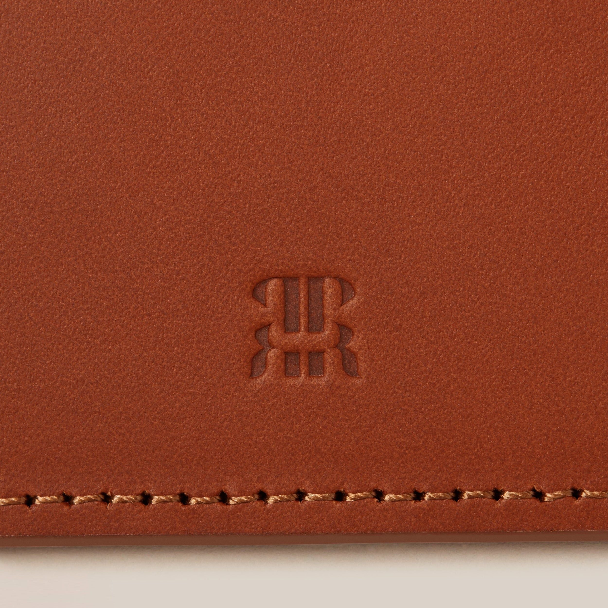 Leather Passport Holder — close-up of embossed leather texture