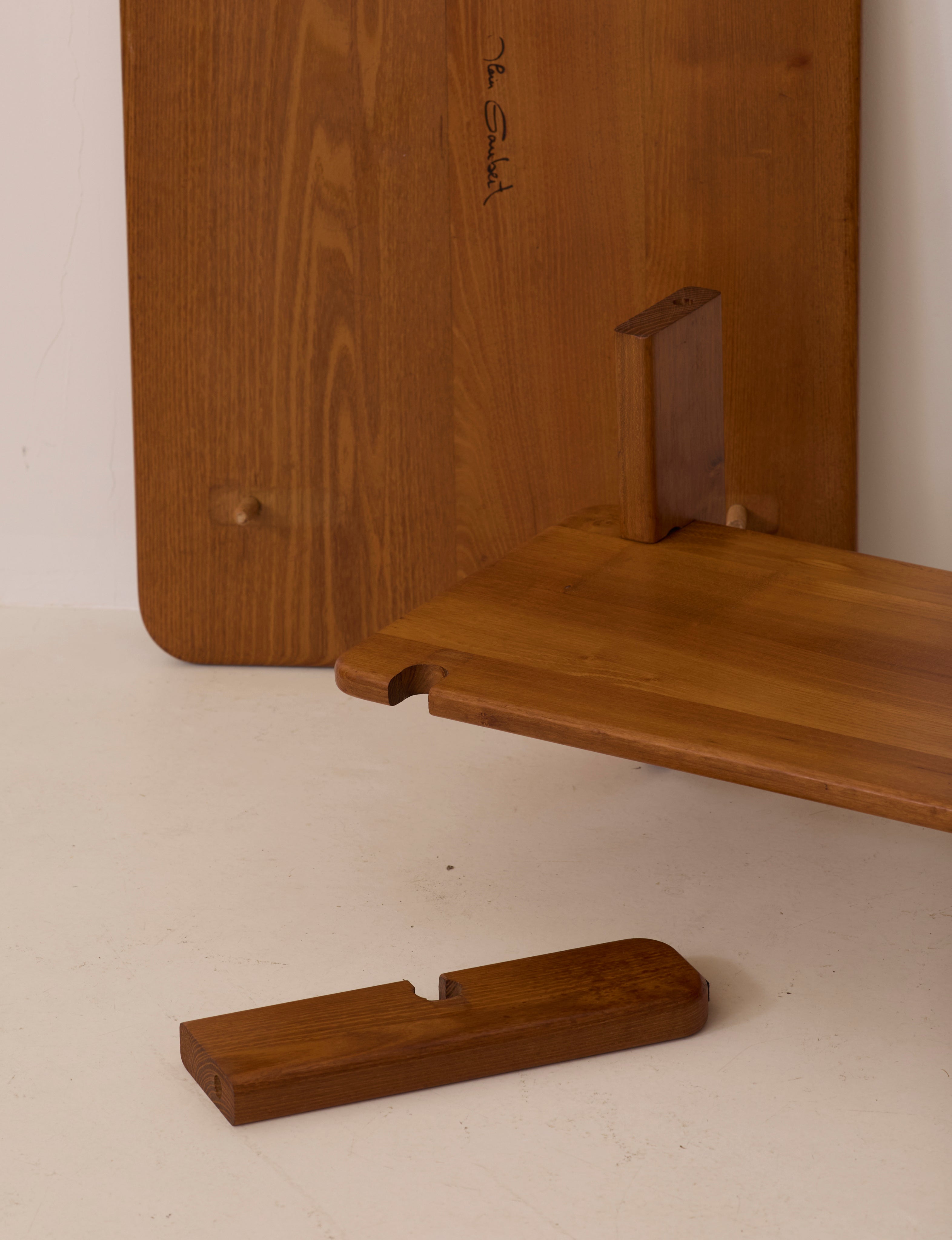 Solid elm coffee table by Alain Gaubert, France circa 1980 — detail of wooden joinery and finish