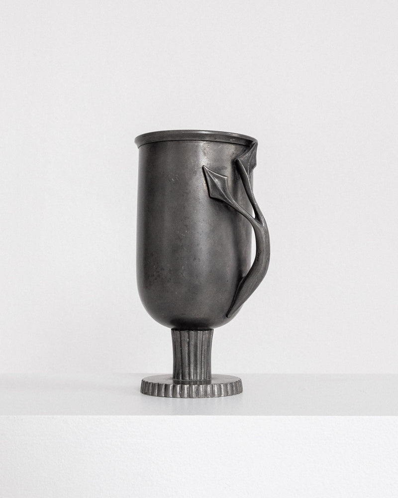 Elegant Swedish pewter vase with leaf-shaped spout and fluted base