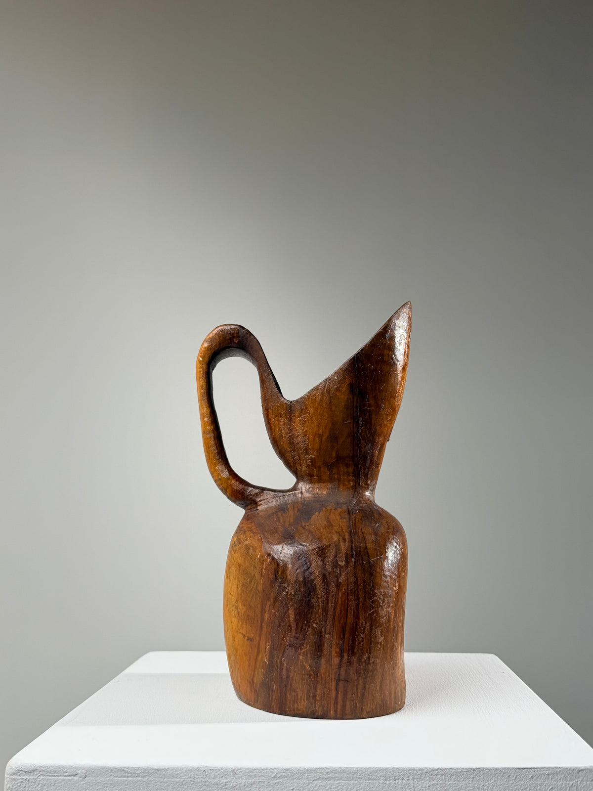 Carved olive wood pitcher, France, early 20th century.  by Figuresdesign | The Oblist
