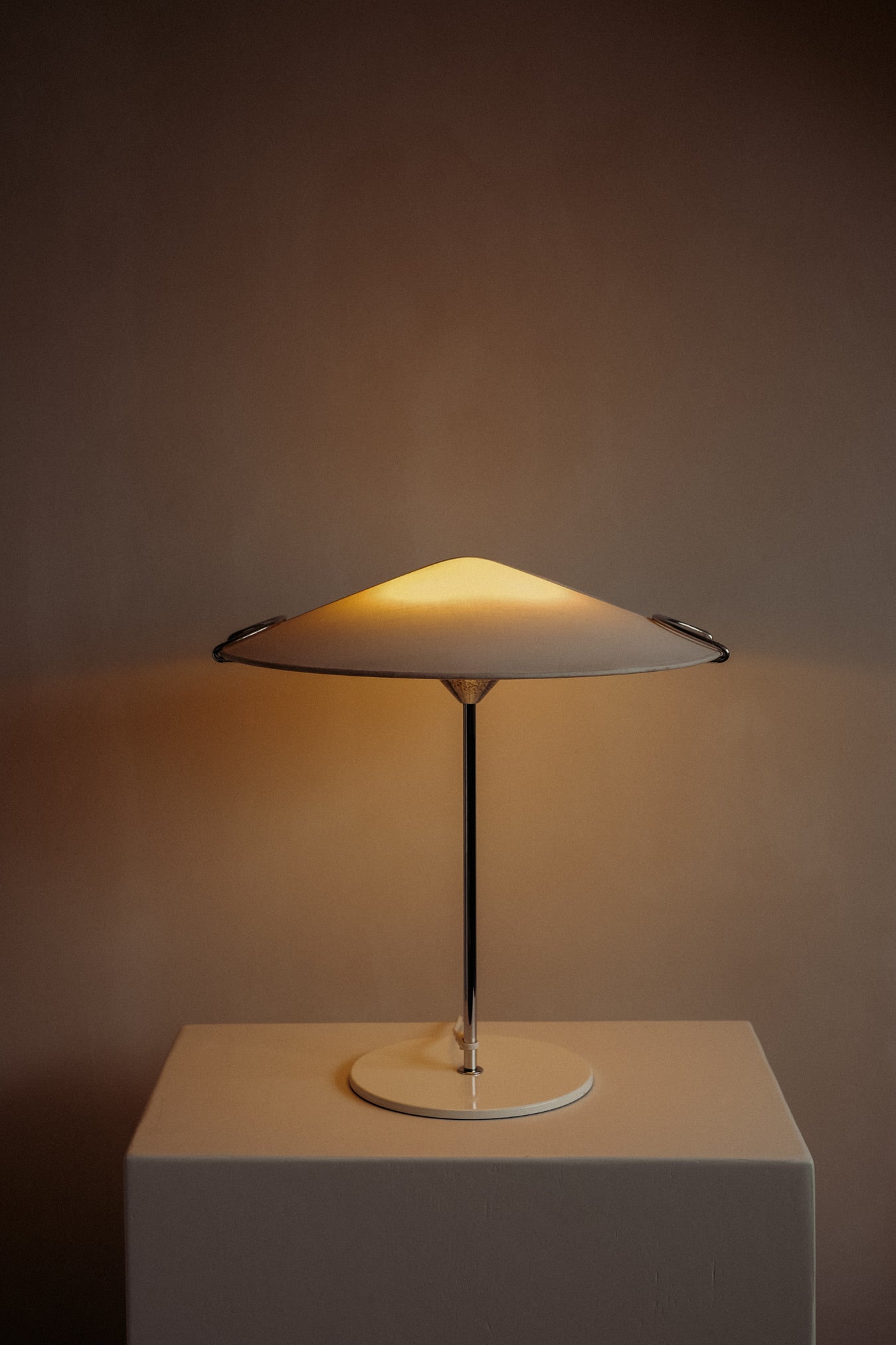 Cello Table Lamp 1980s — lit in minimalist indoor setting