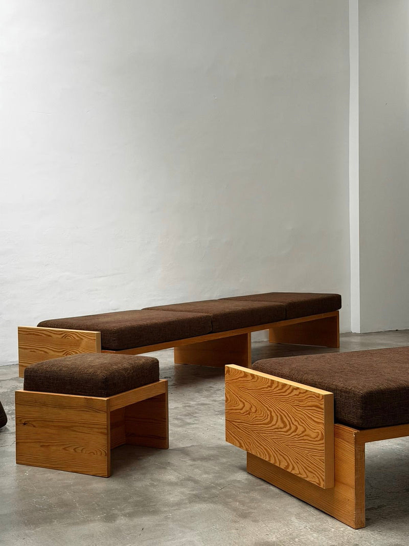 Modernist Benches and Stool, c.1970 — close-up of wooden frame and brown upholstery