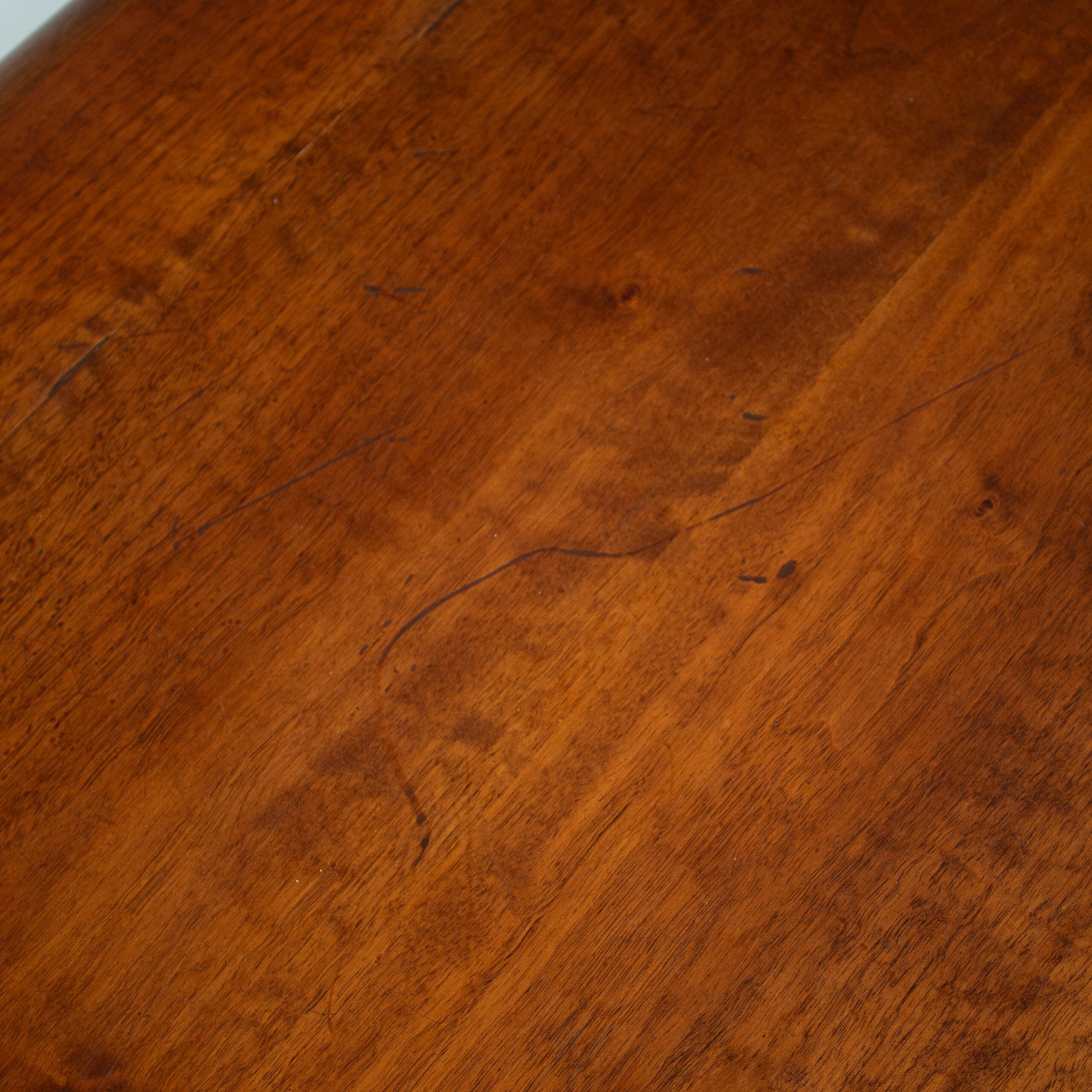 Vintage Solid Wood Coffee Table — close-up of rich wood grain texture