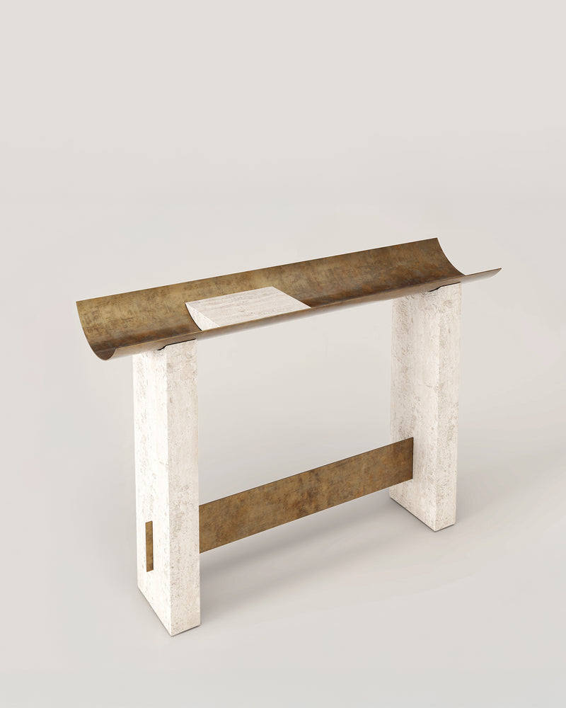 Brut console three-quarter view showing curved metal top on stone base