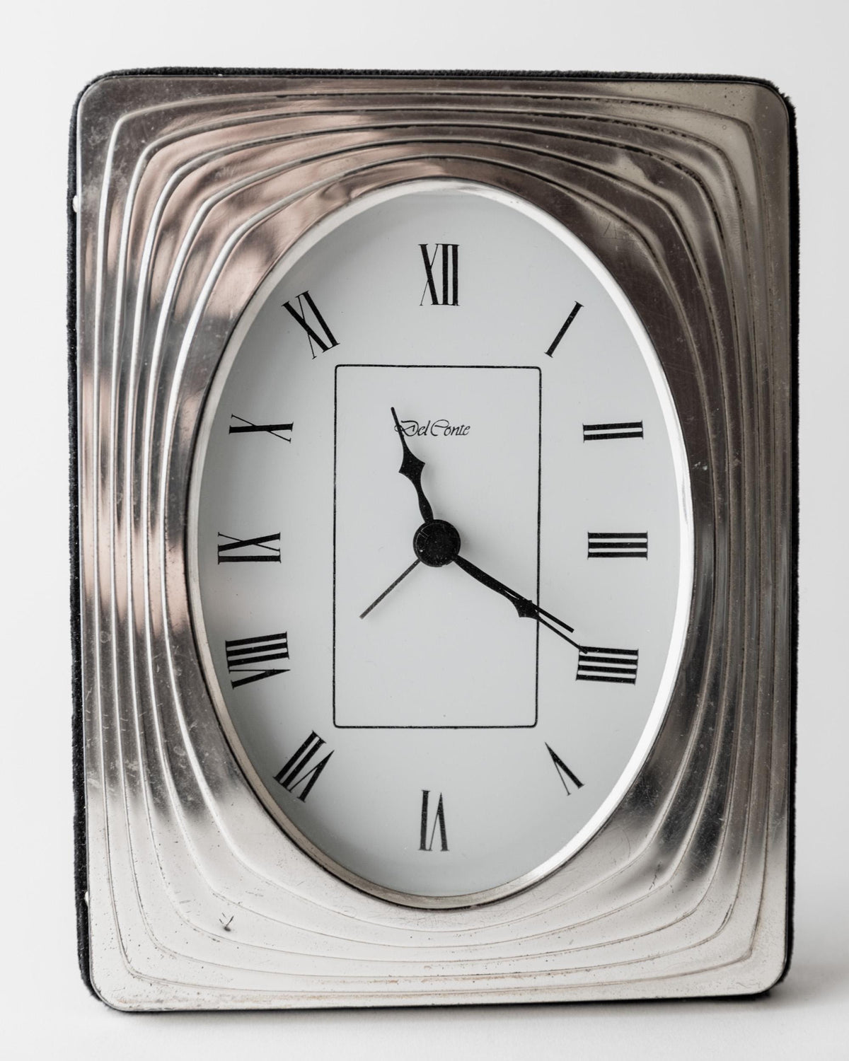 Vintage 1960s Silver Plated Desk Clock by Del Conte Italy, Rectangular Case with Oval Clock Face, Mid Century Design, Elegant Gift Idea — side angle