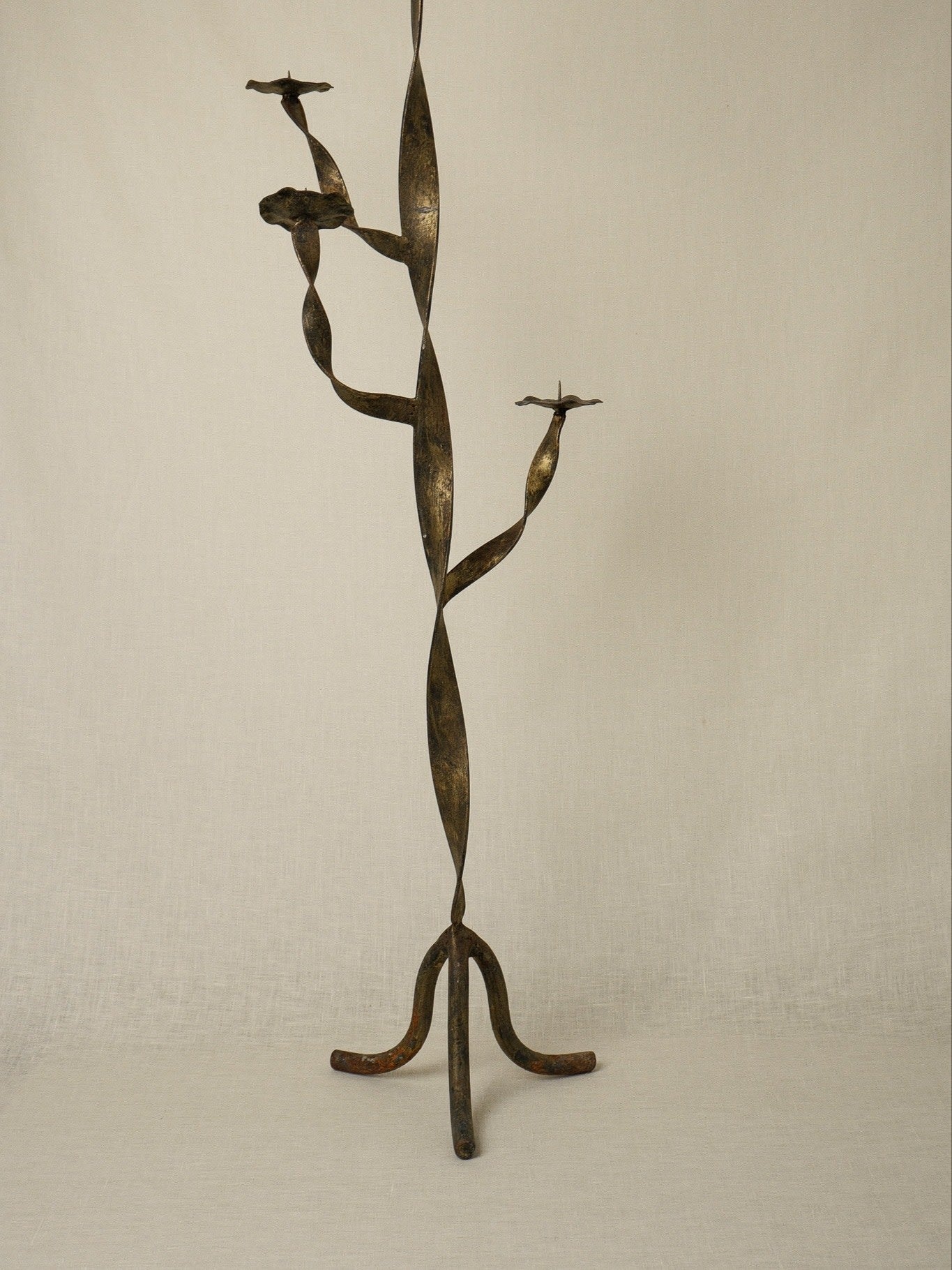 Pair of Gold-Patinated Iron Candlesticks — close-up