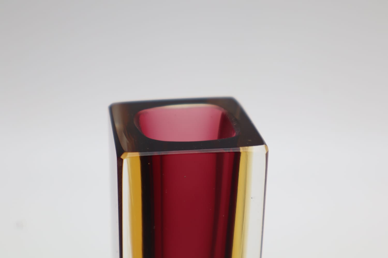 Authentic Flavio Poli Murano Sommerso Block Vase – Ruby Red & Amber – Italy, 1960s — lifestyle setting