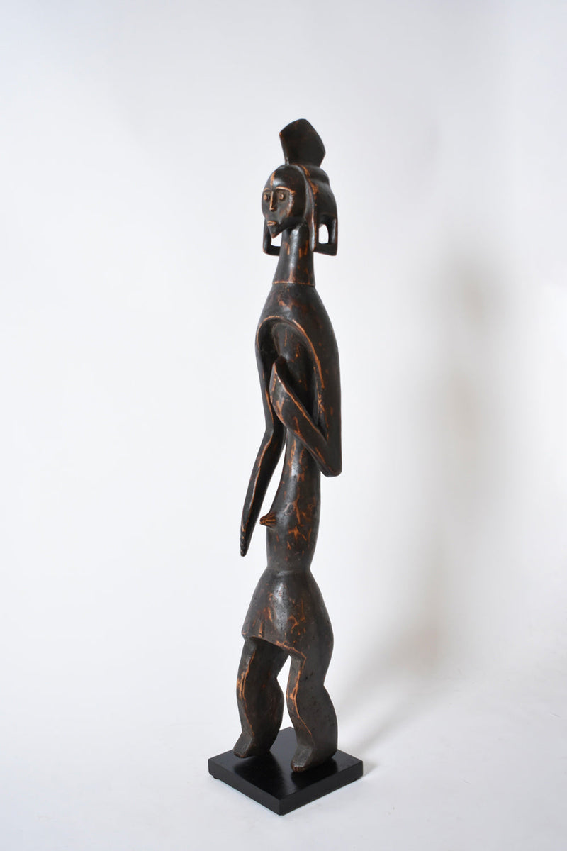 Anthropomorphic African Wooden Sculpture — side view highlighting dark wood finish