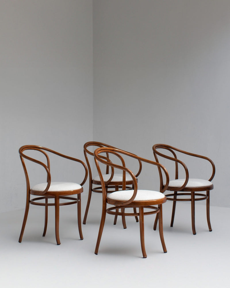 Set of Four Thonet Bentwood Armchairs in Walnut with Bouclé Upholstery — side angle