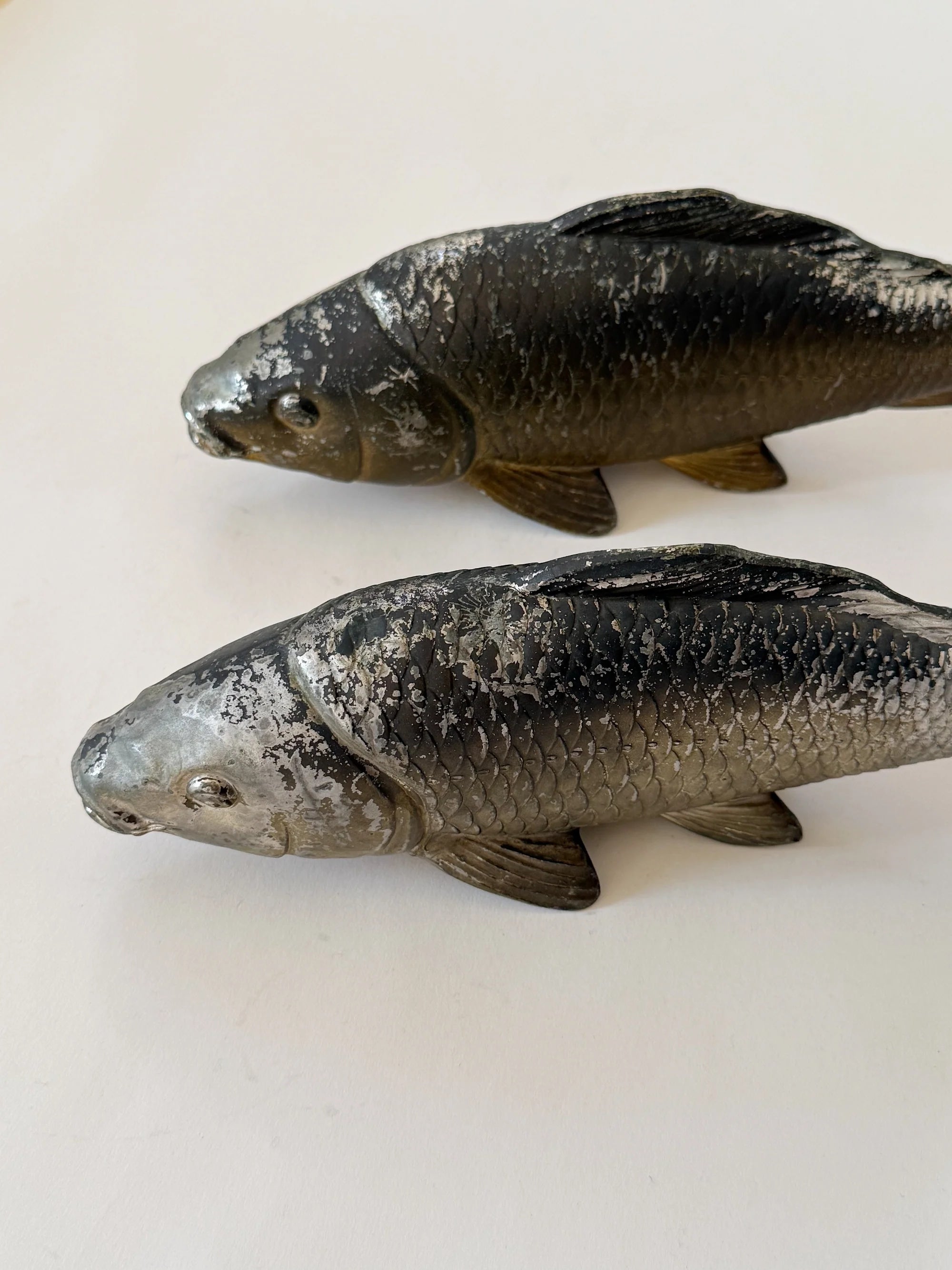 Cast Metal Koi Fish, Japan — angled view on white surface