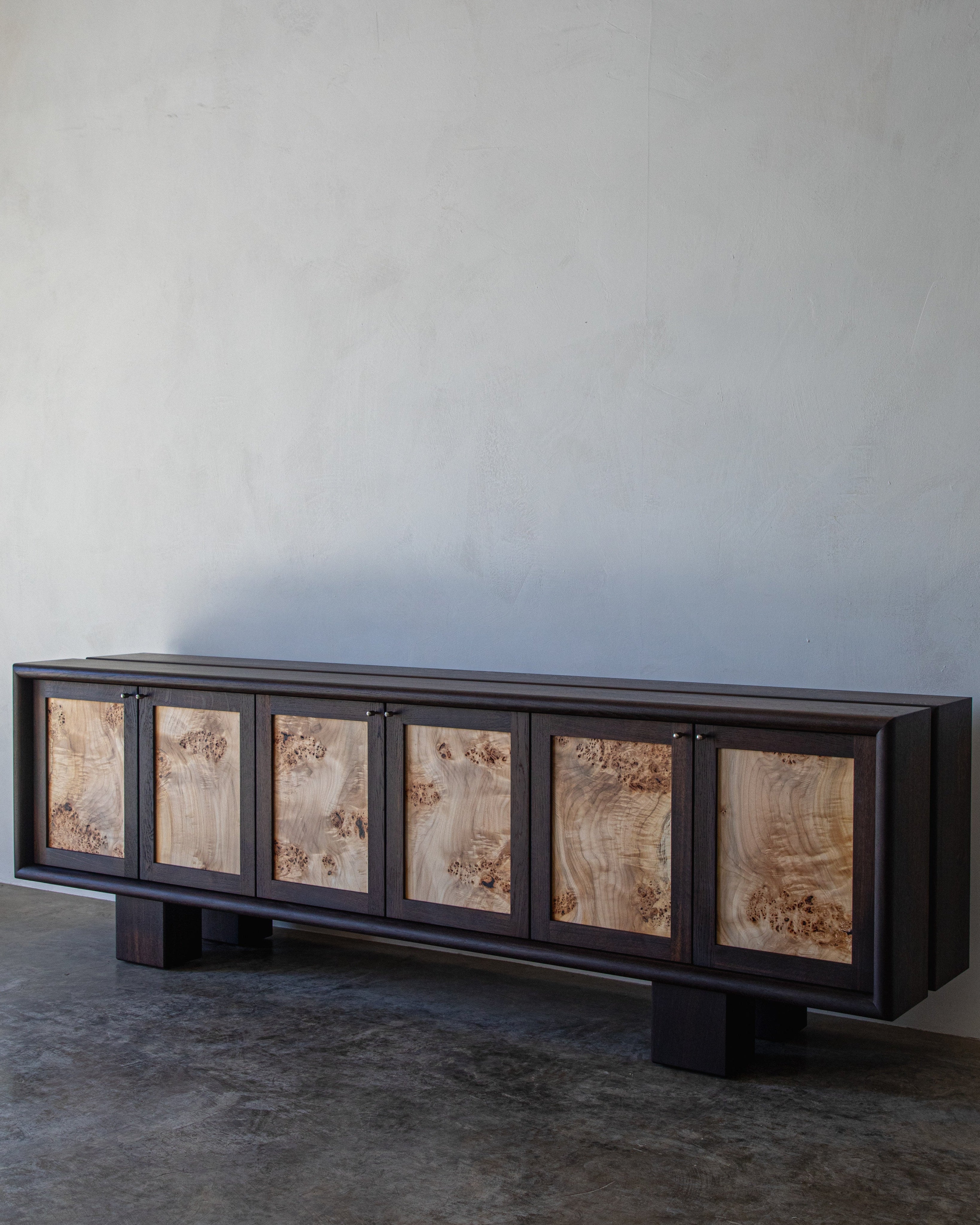 Elwha Cabinet — front view with natural wood grain doors