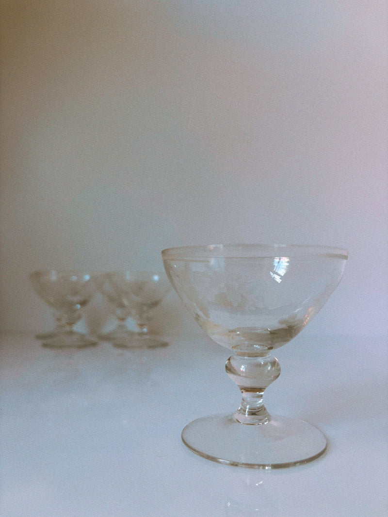 Vintage etched floral wine glass with ornate stem detail