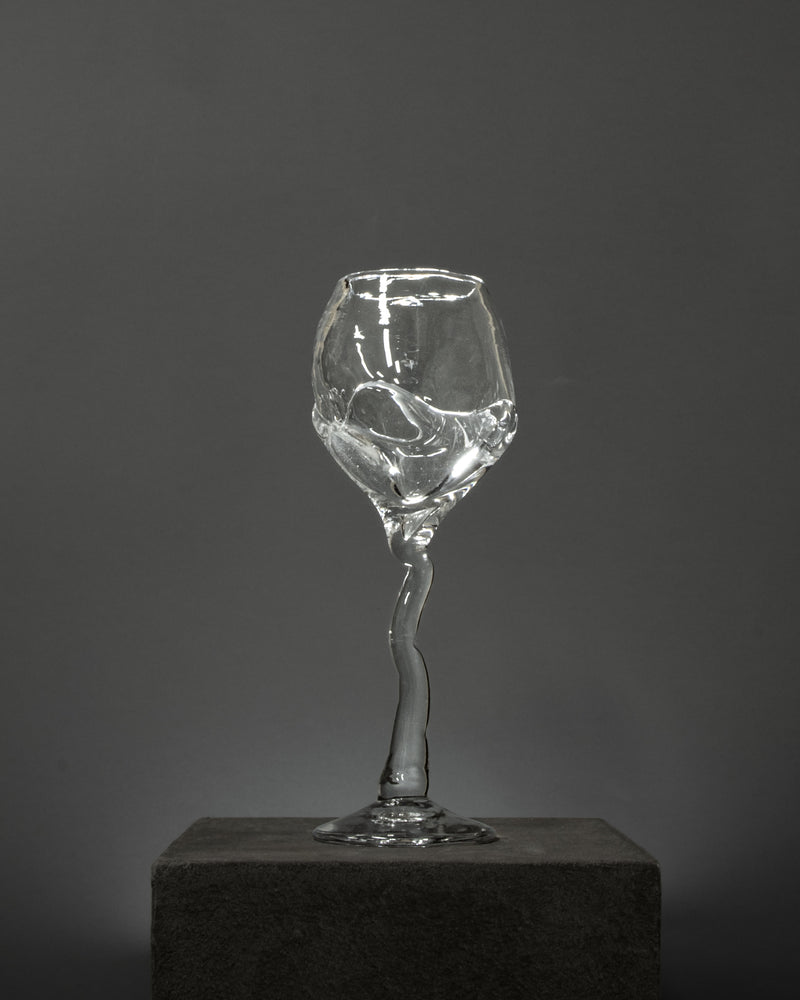 Hand-blown Wine Glass — close-up of clear glass with twisted stem